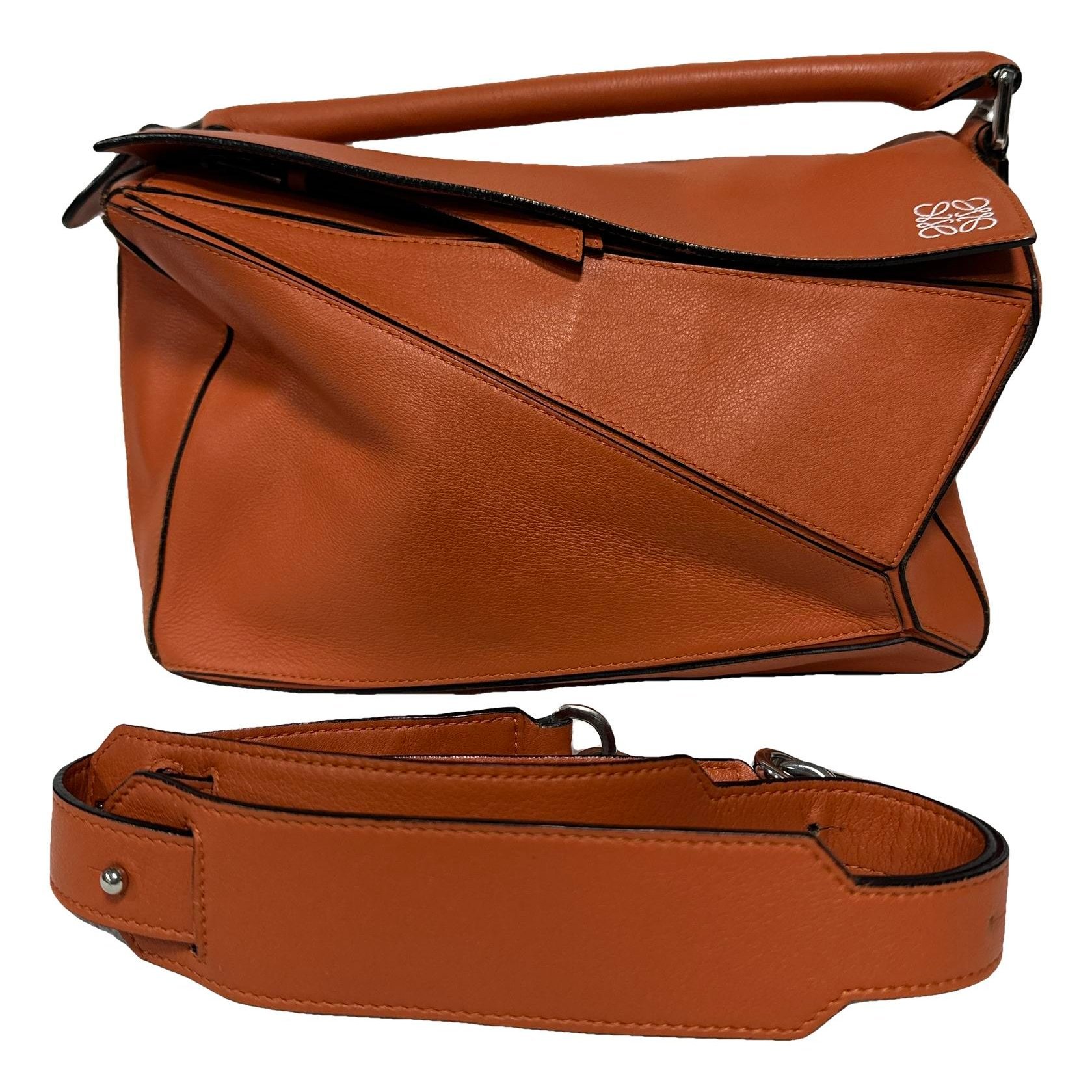 Puzzle leather handbag