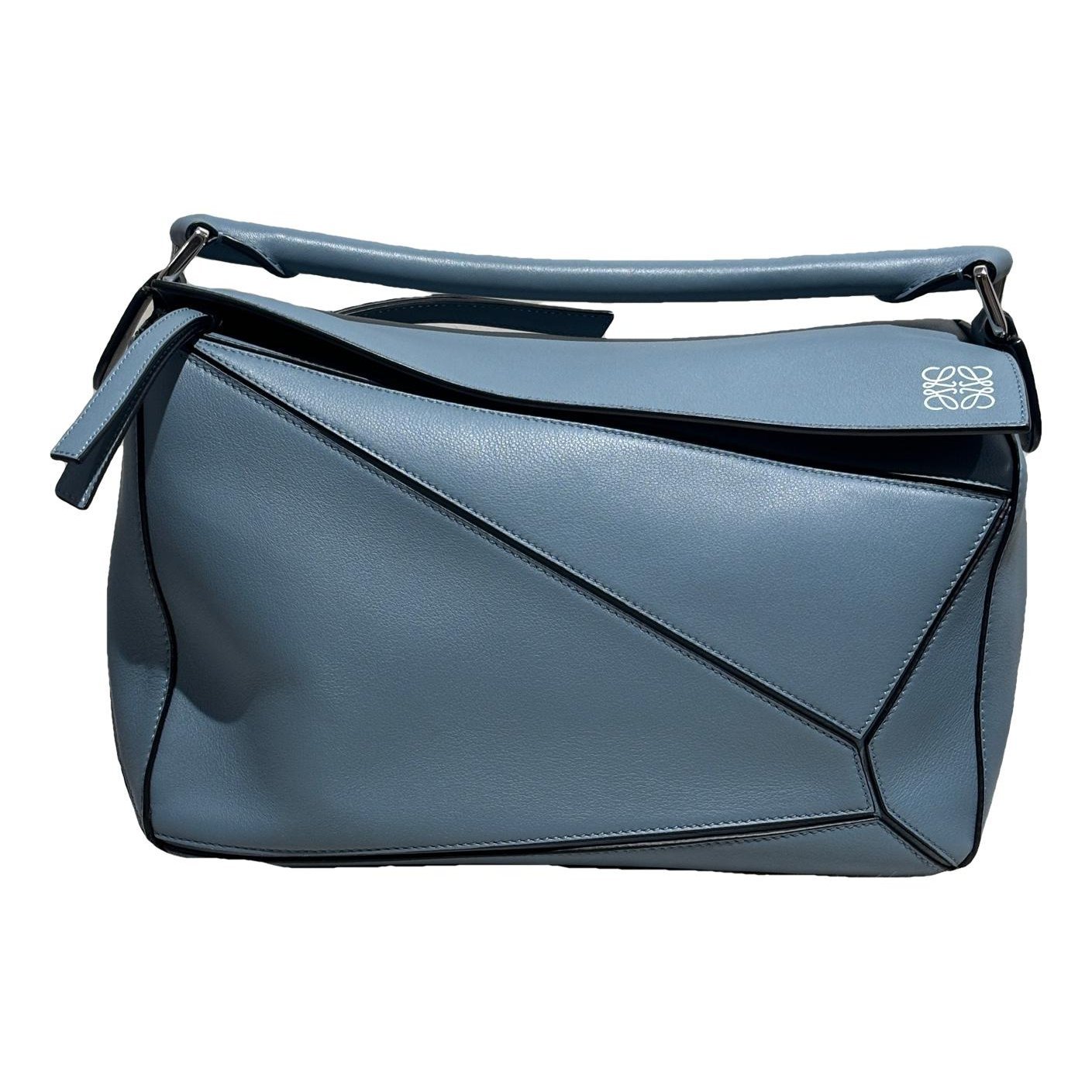 Puzzle leather handbag