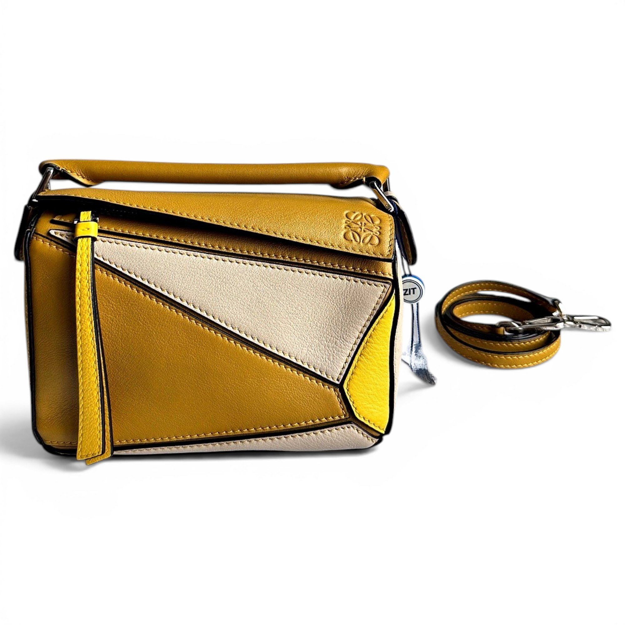 Puzzle leather handbag