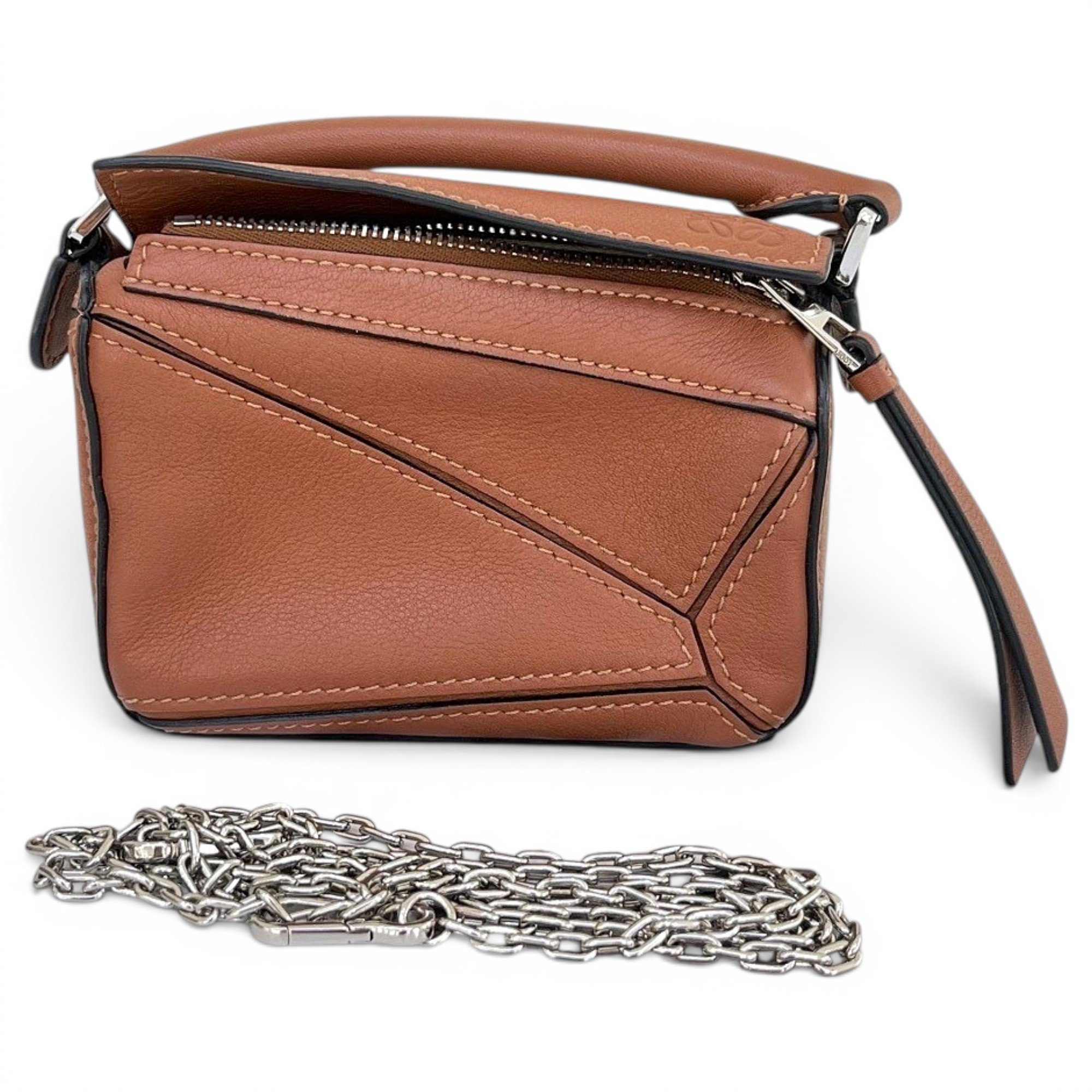 Puzzle leather handbag