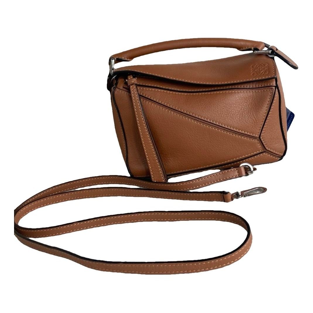 Puzzle leather handbag