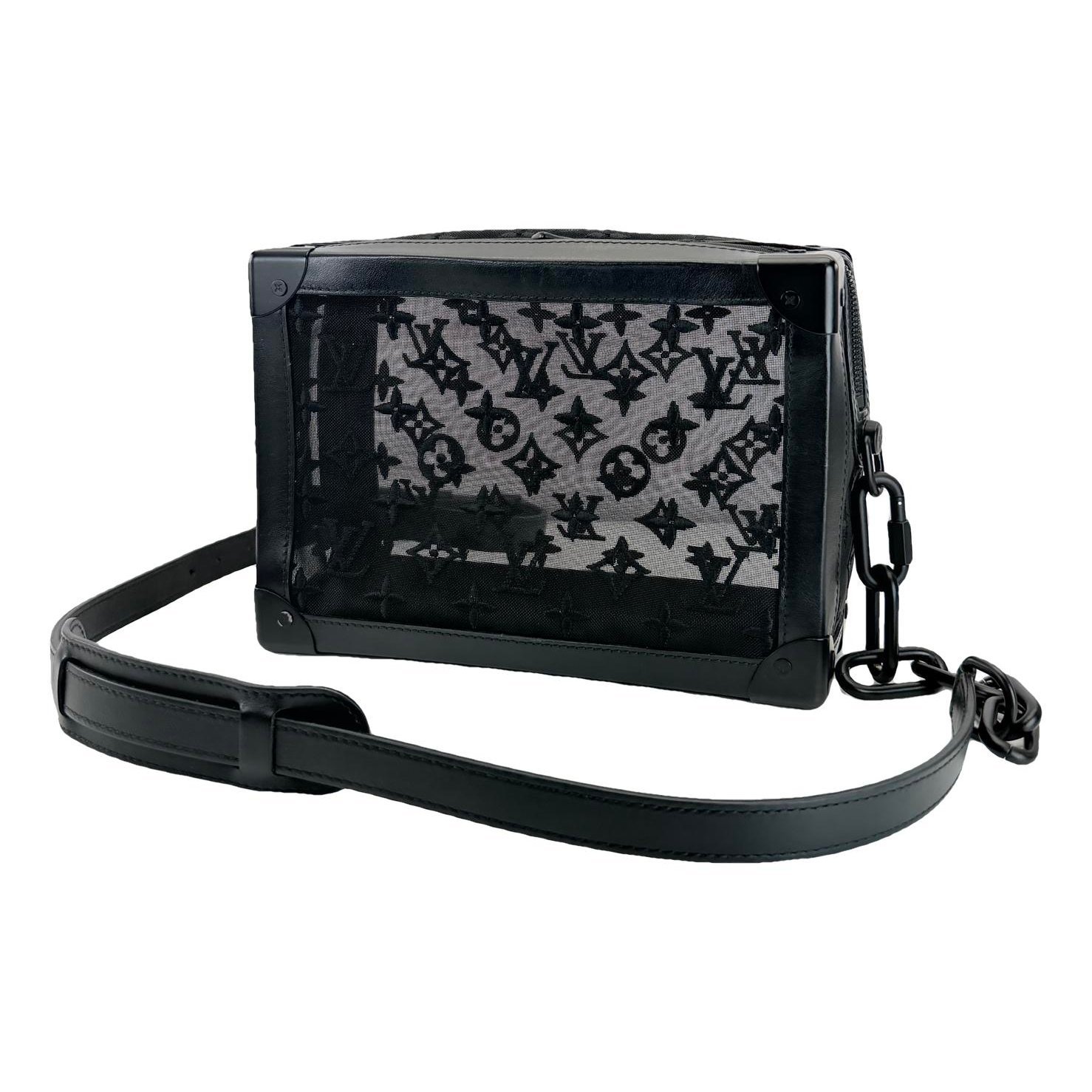 Pochette Trunk leather handbag