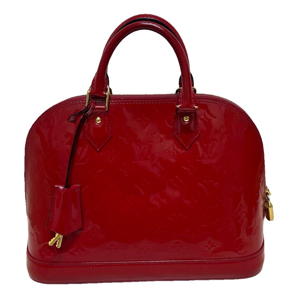 Alma patent leather handbag