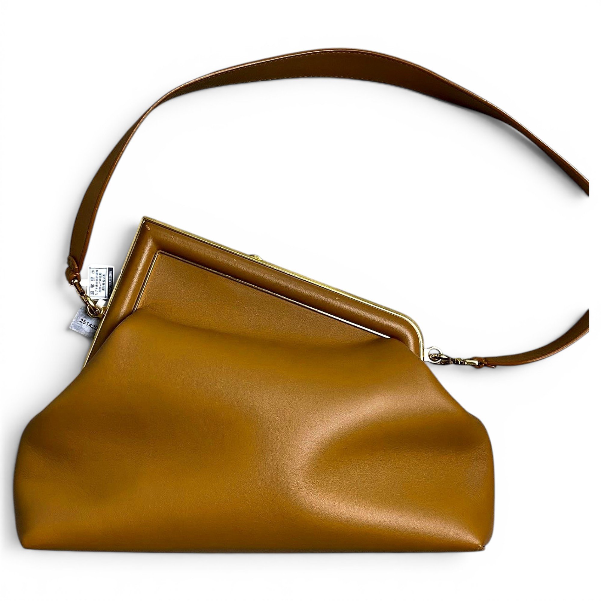 First leather handbag