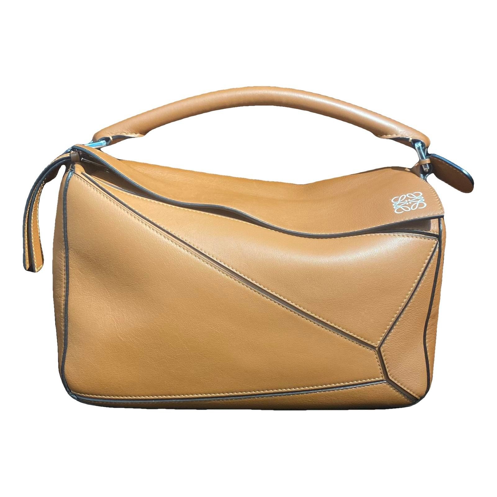 Puzzle leather handbag