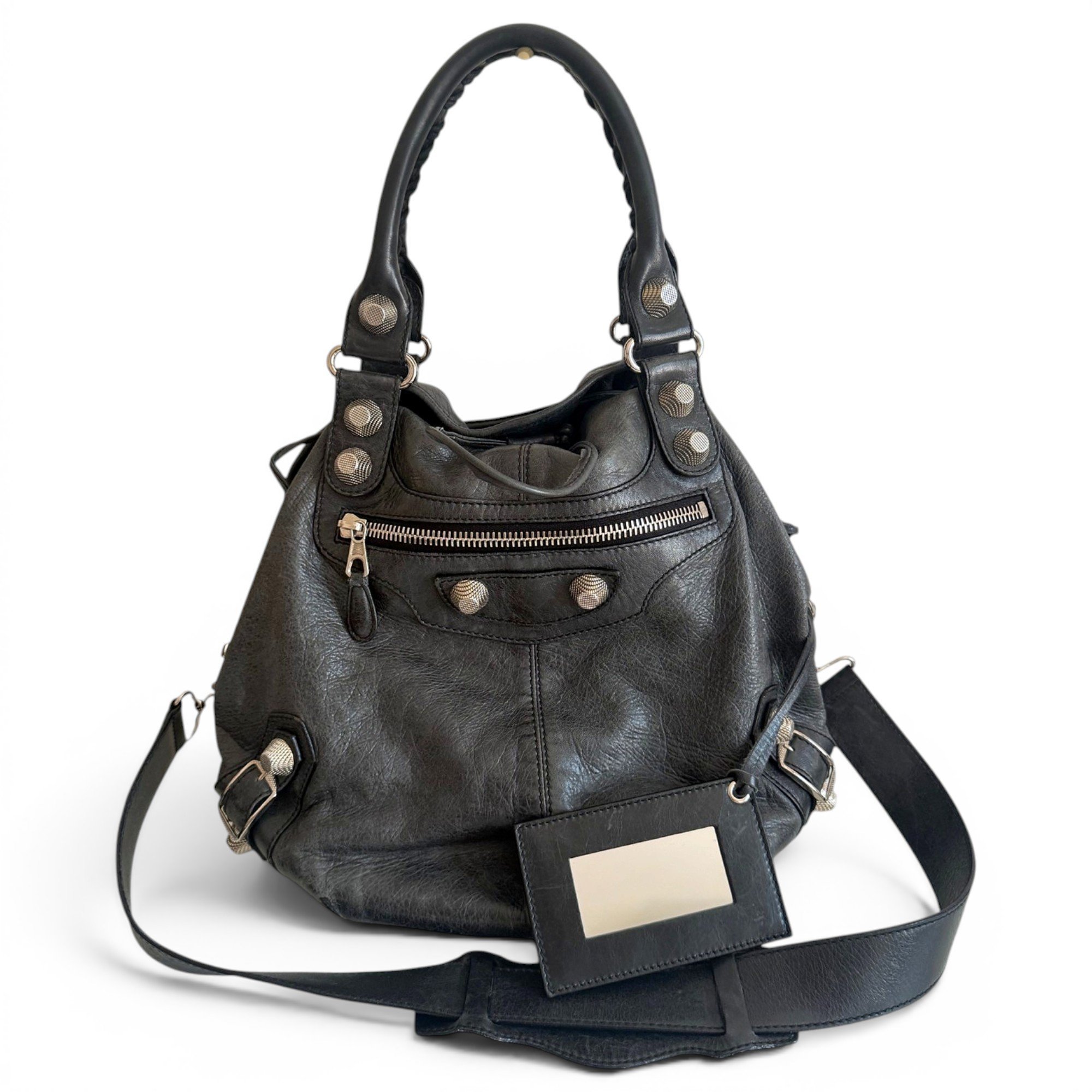 Pompon leather handbag