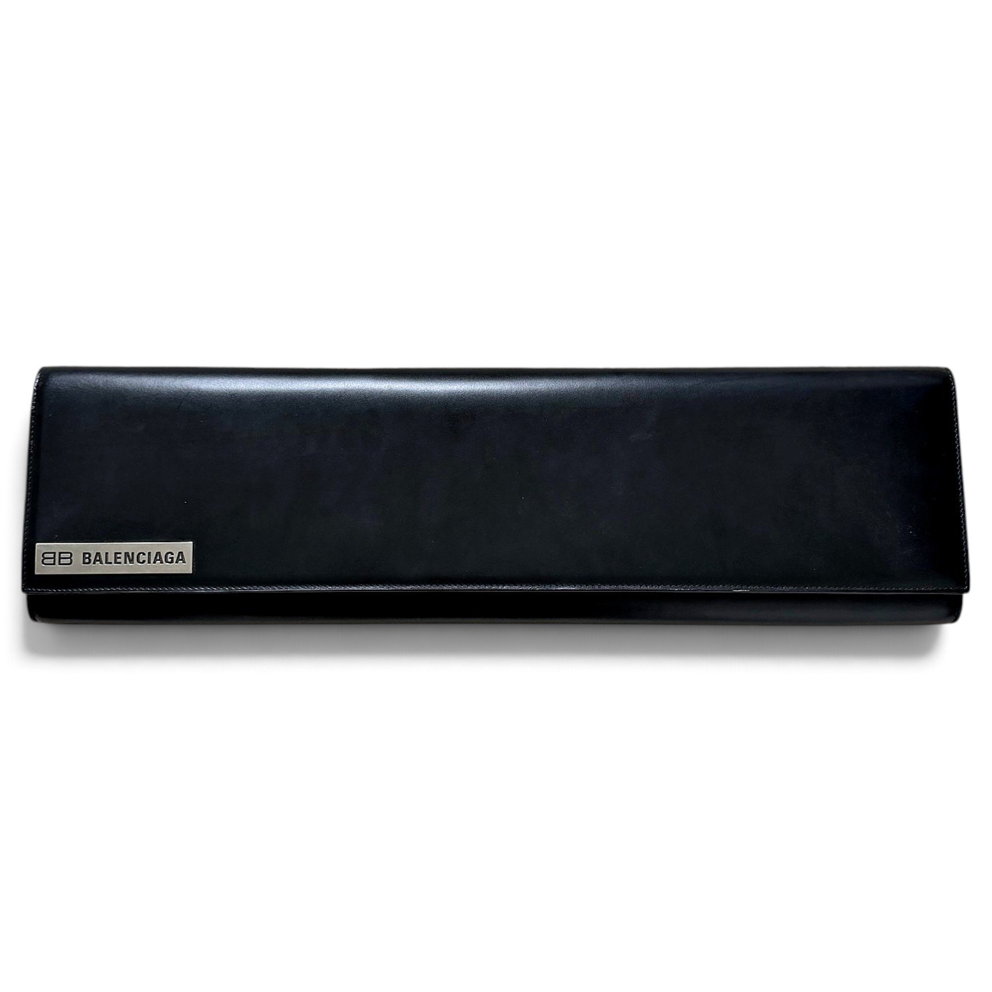 Hard leather clutch bag