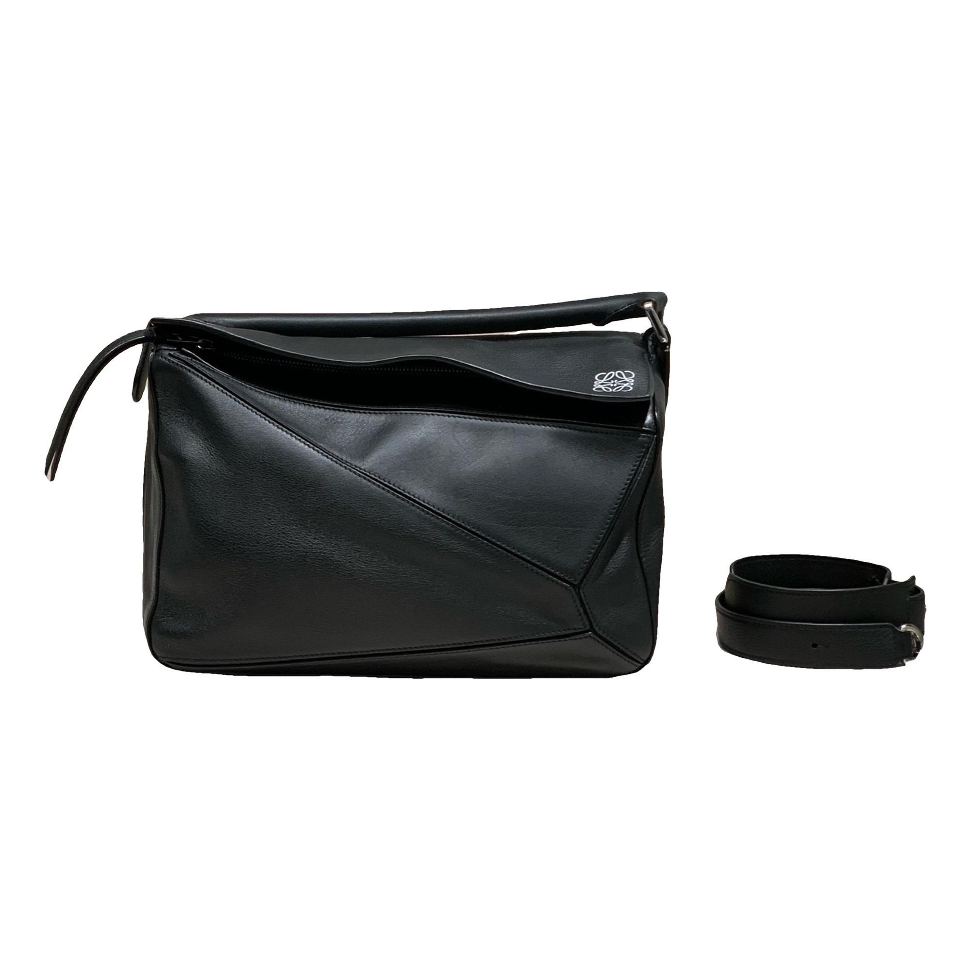 Puzzle leather crossbody bag