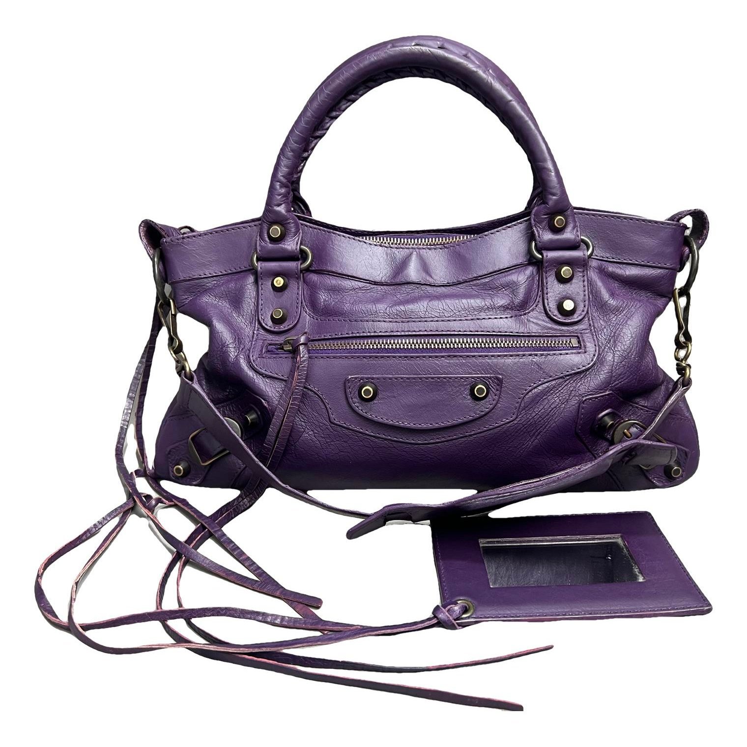 First leather handbag