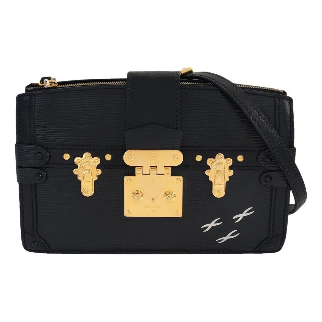 Louis Vuitton Pochette Trunk leather handbag