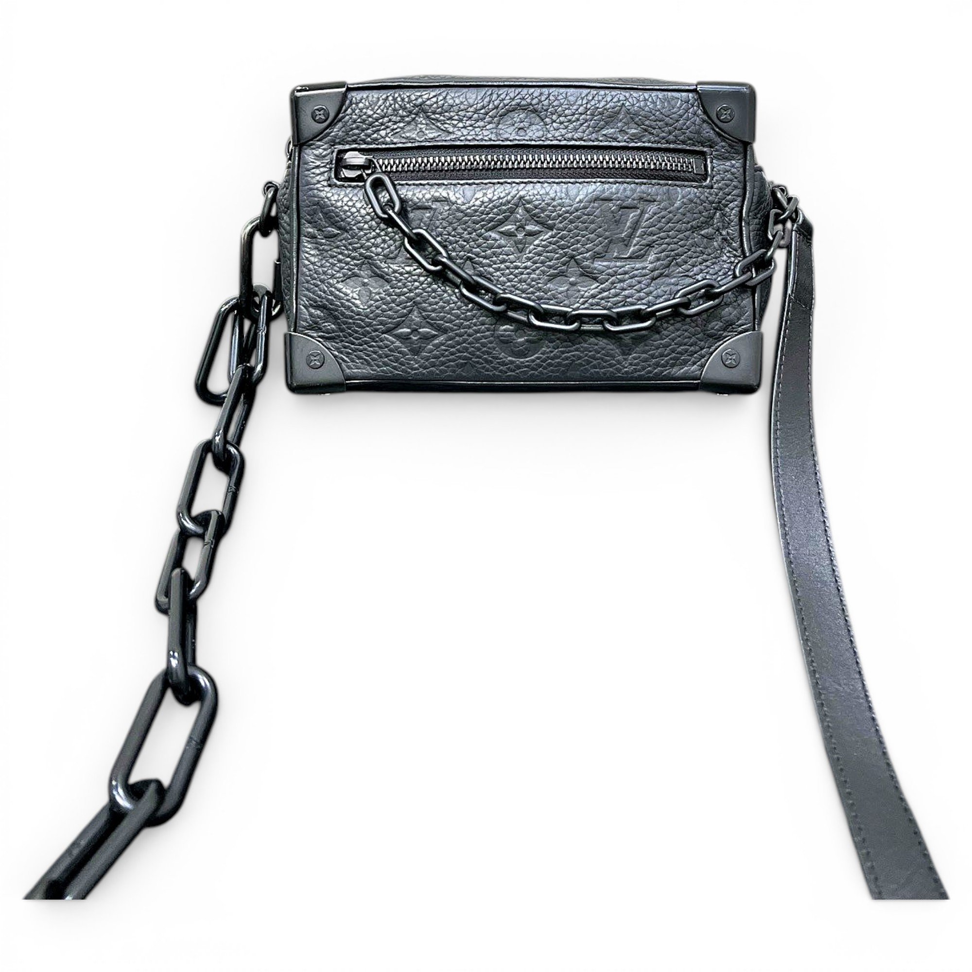 Pochette Trunk leather handbag