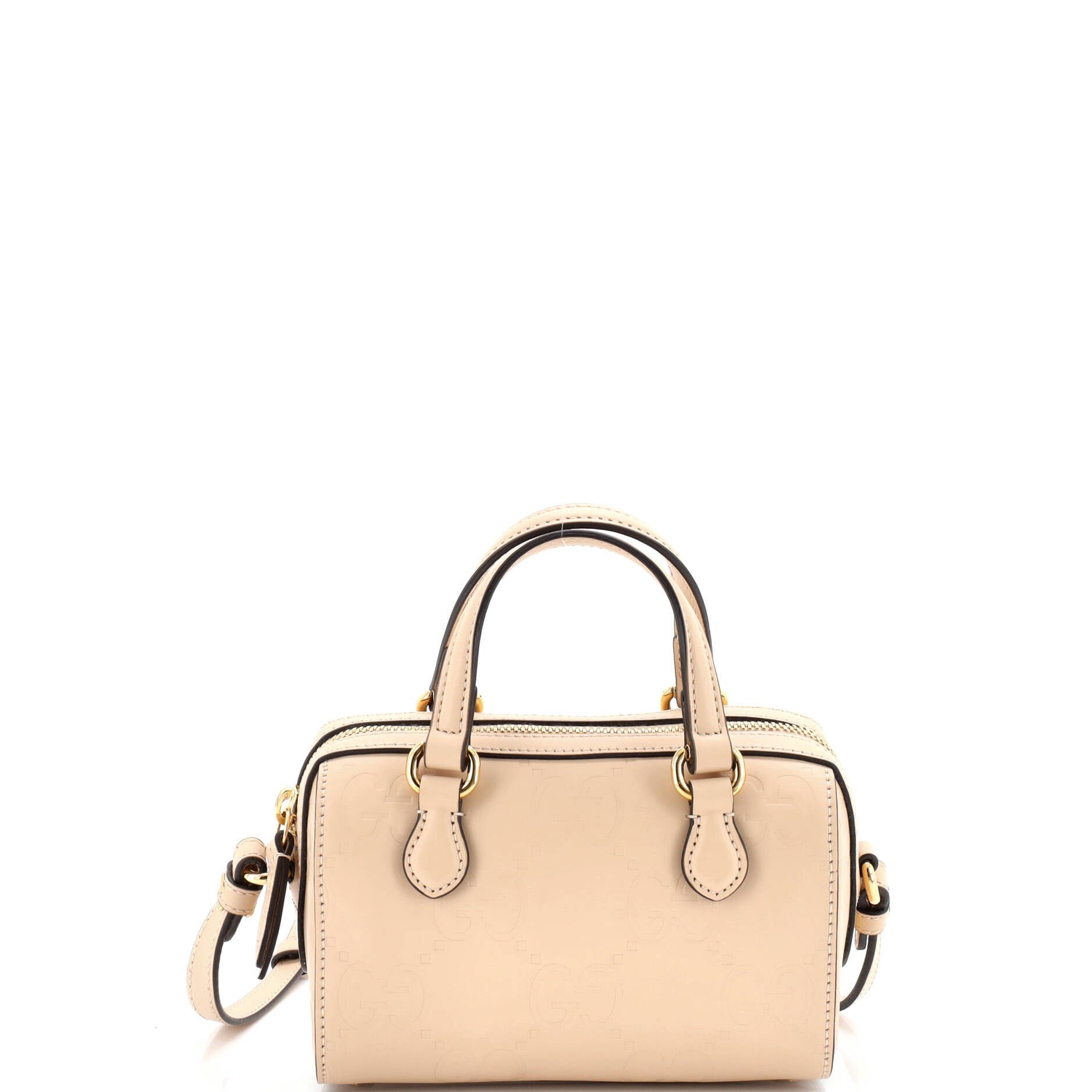 Gucci Convertible Top Handle Bag Jumbo GG Embossed Leather Mini