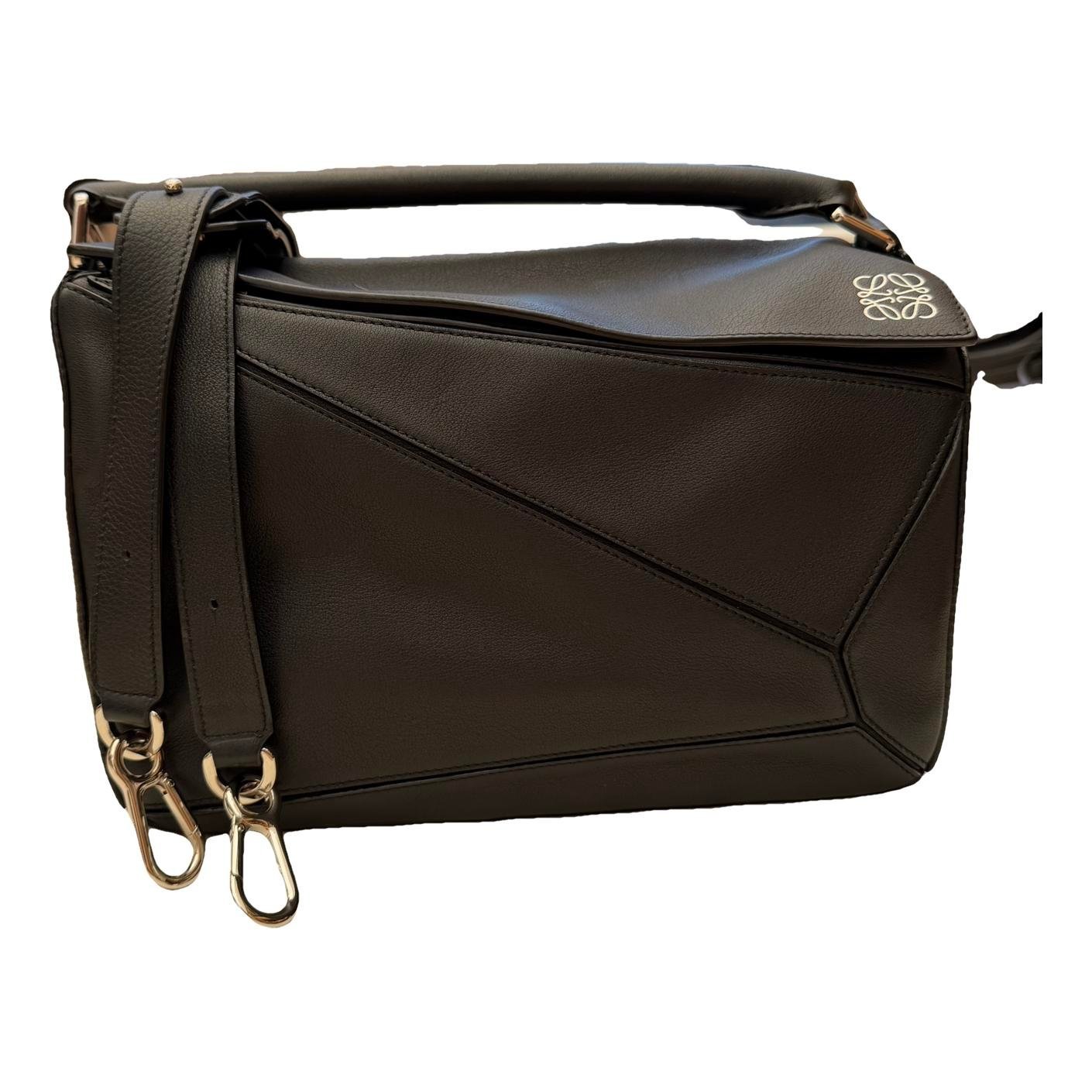 Puzzle leather handbag