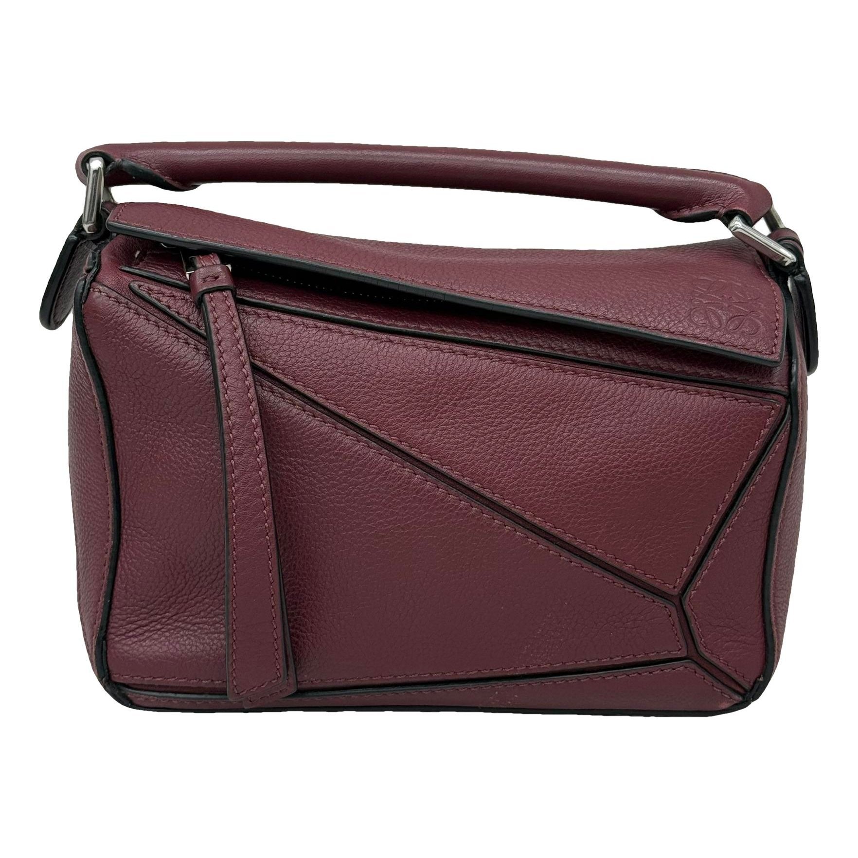 Puzzle leather handbag