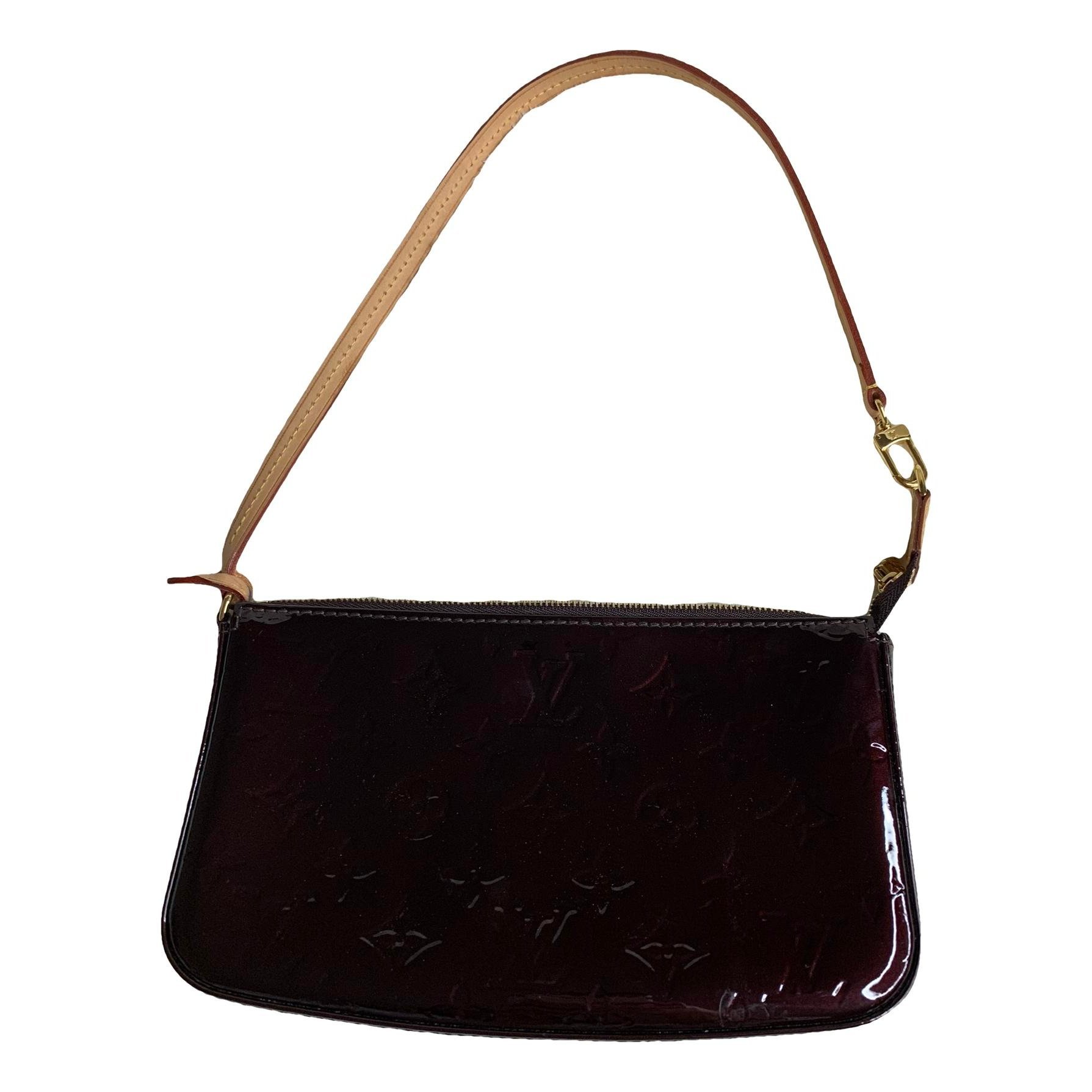 Pochette Accessoire patent leather mini bag