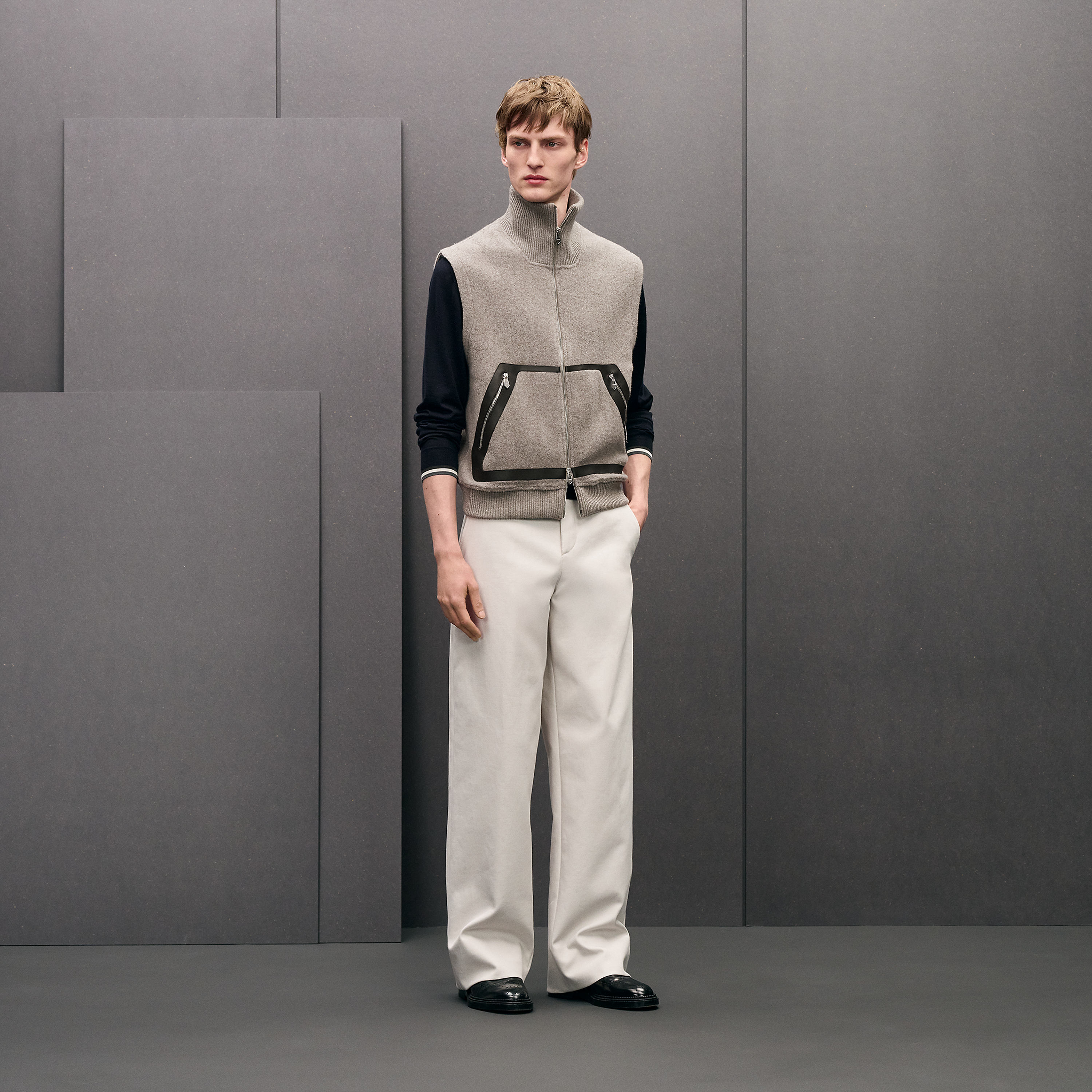 Vest with leather details	