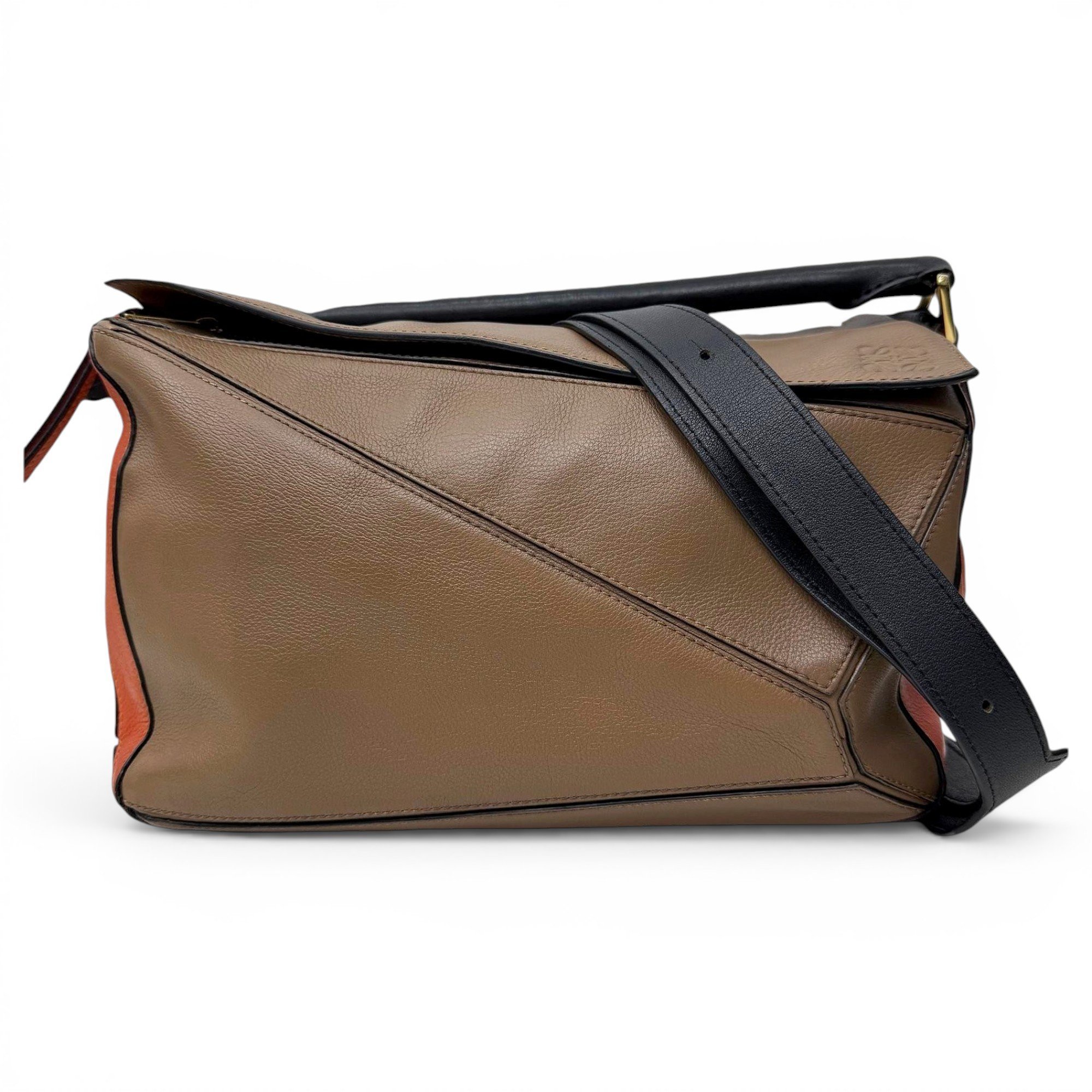 Puzzle leather handbag