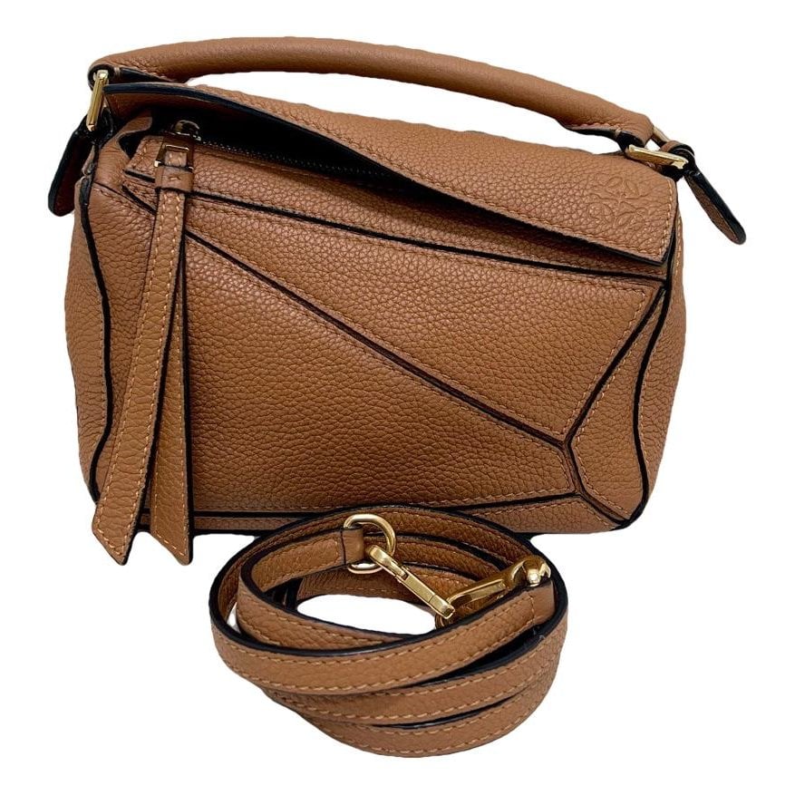 Puzzle leather handbag