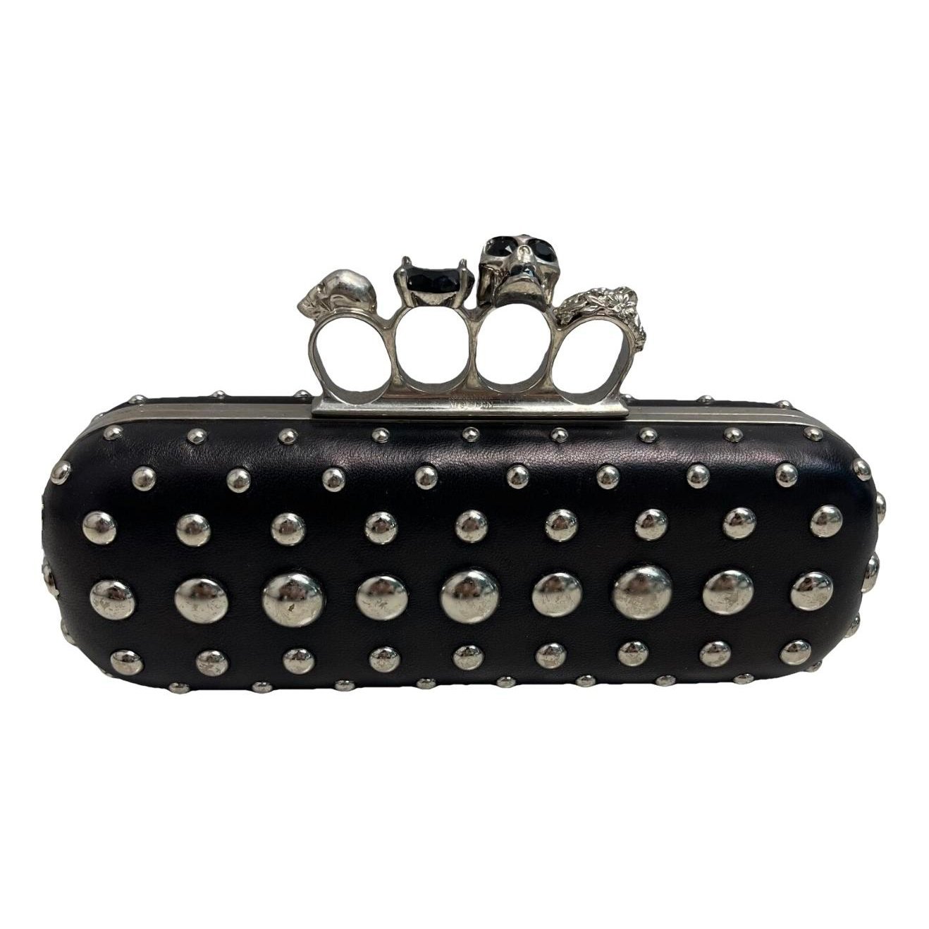 Knuckle leather clutch bag