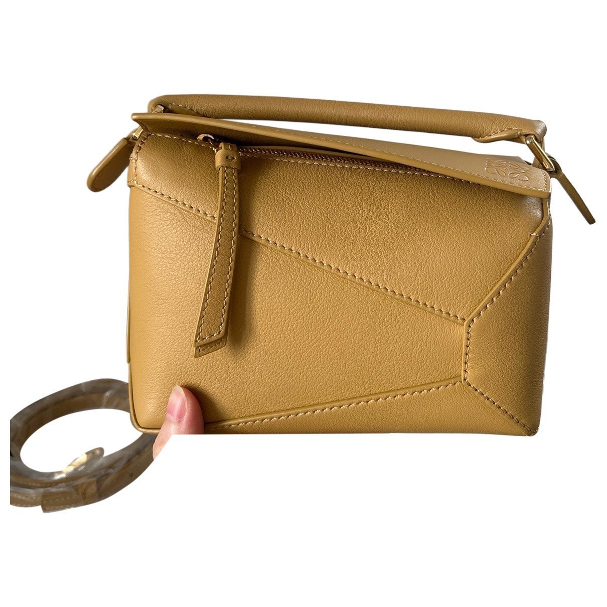 Puzzle leather handbag