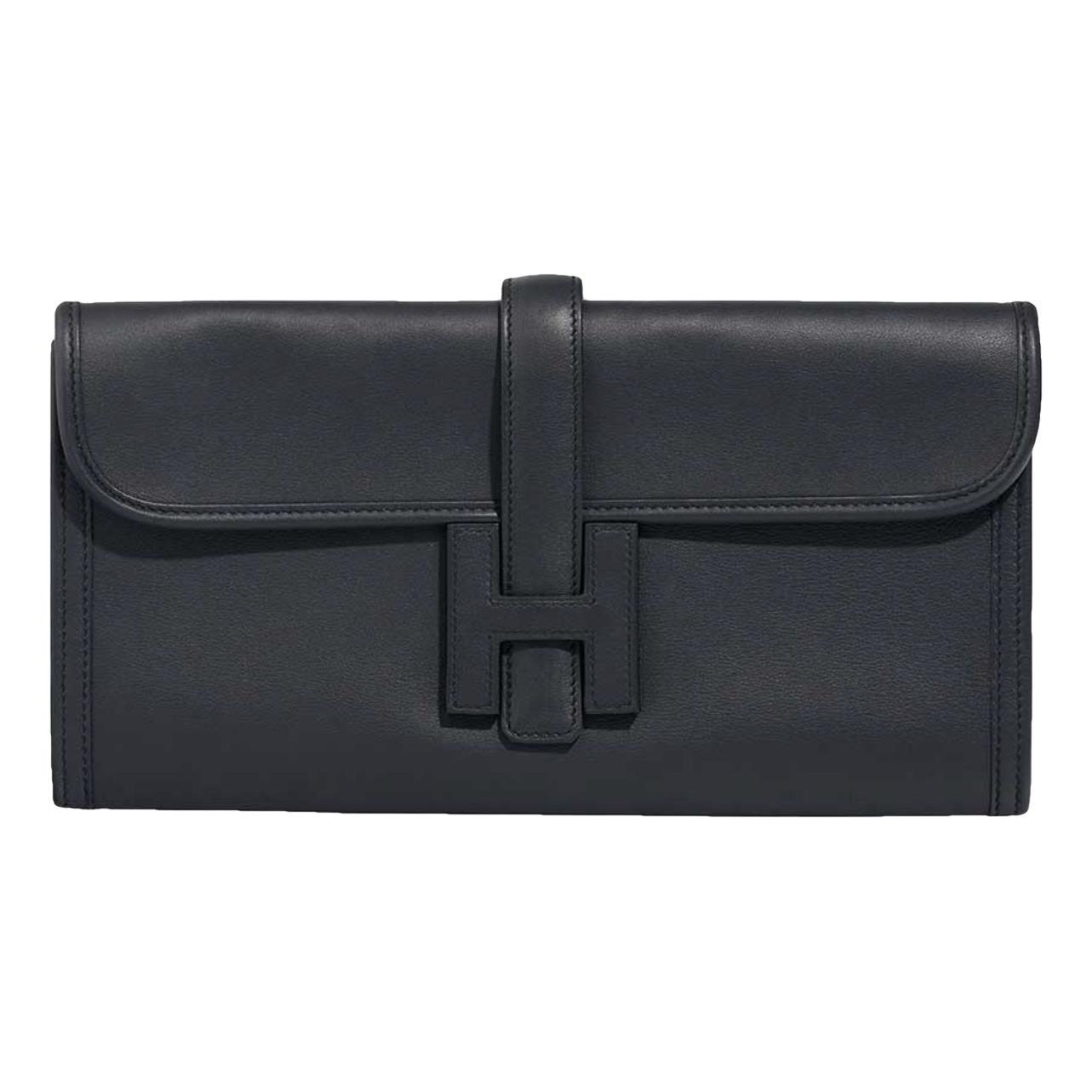 Jige leather clutch bag