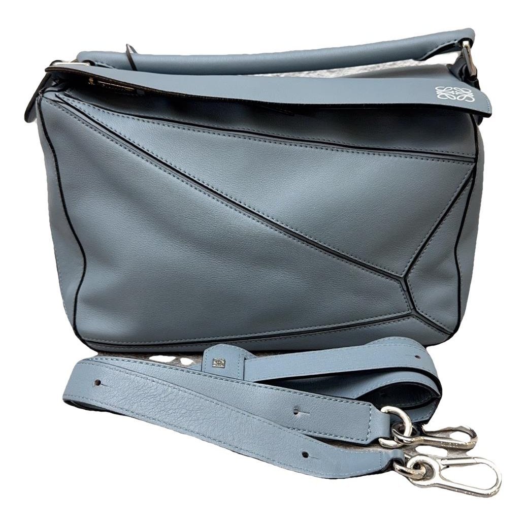 Puzzle leather handbag