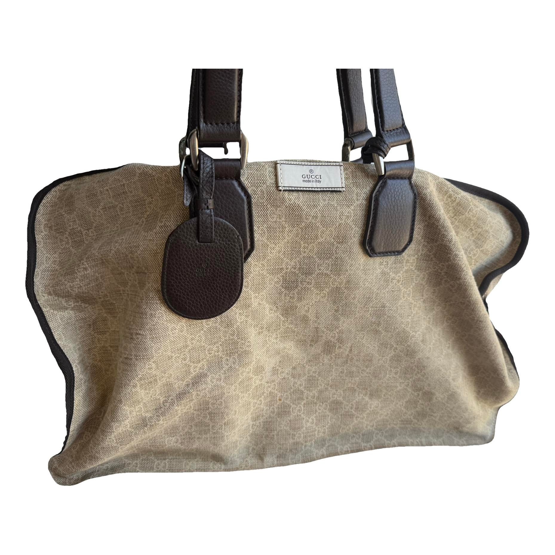 Ophidia leather travel bag