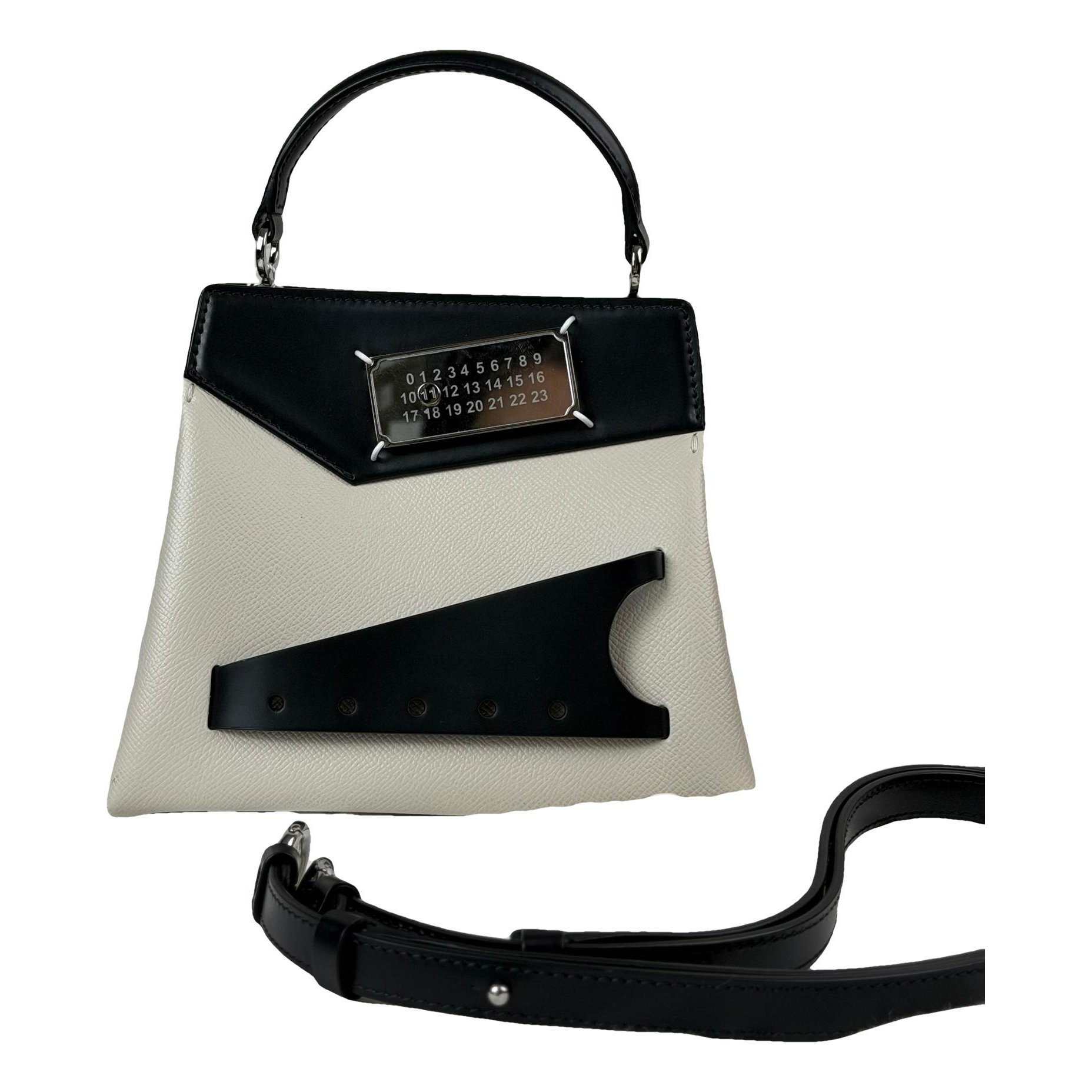 Snatched leather handbag