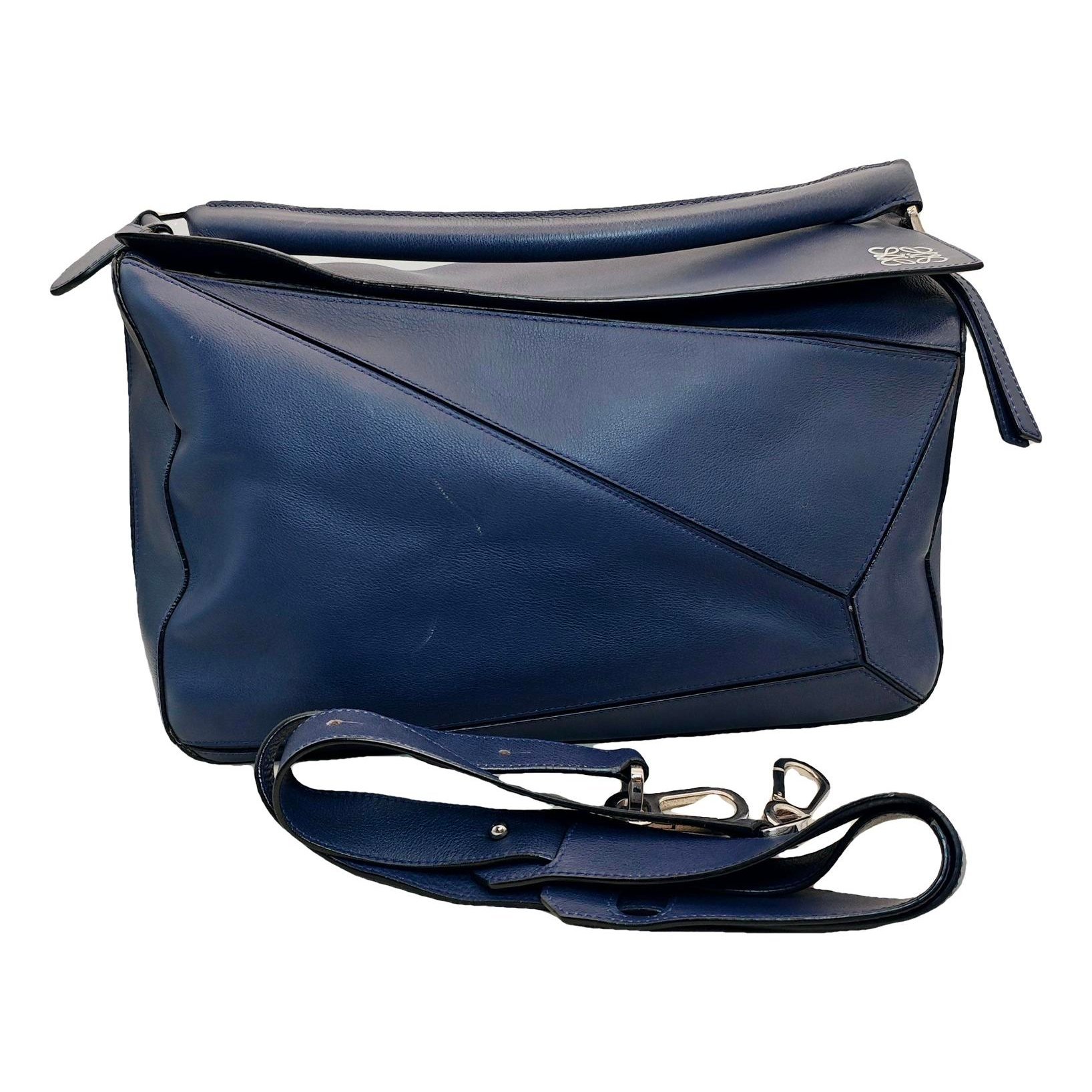 Puzzle leather handbag