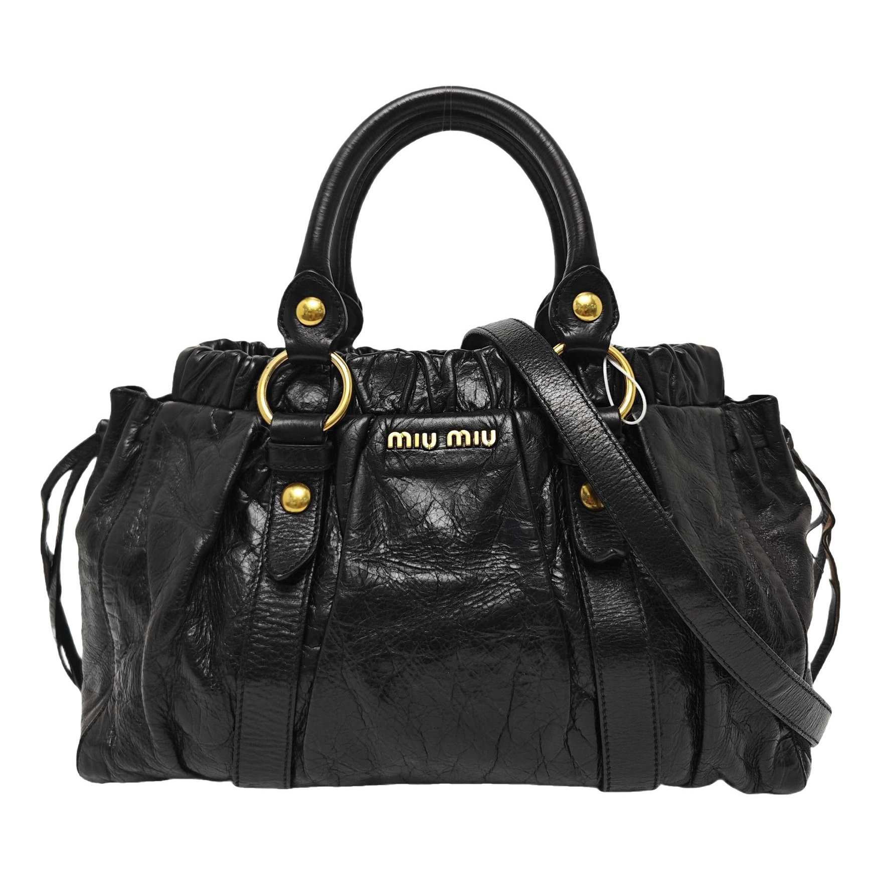 Bow bag leather handbag
