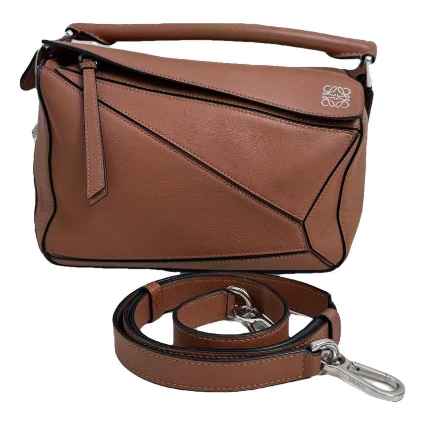 Puzzle leather handbag