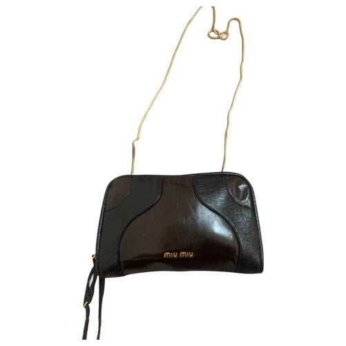 Patent leather clutch bag