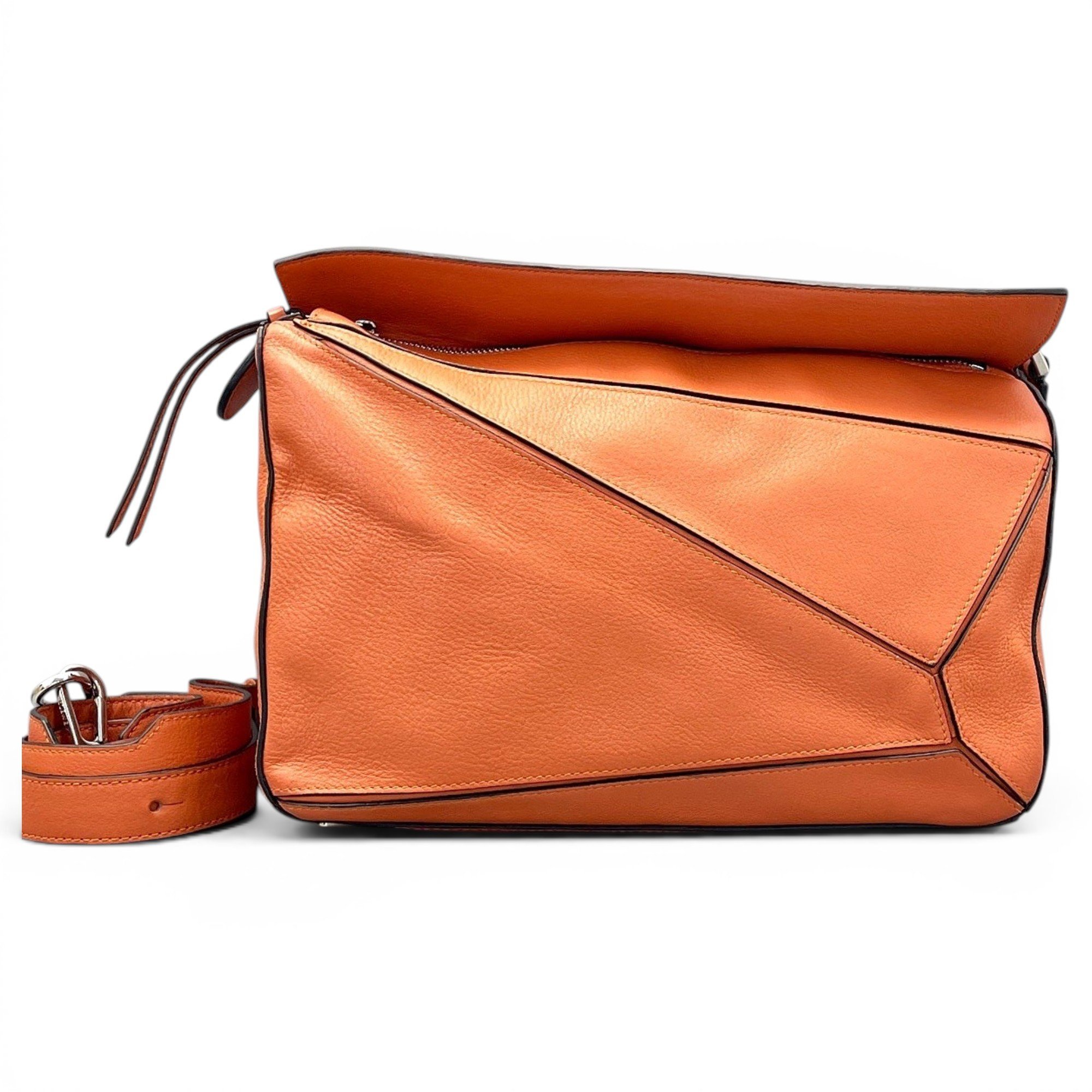 Puzzle leather handbag
