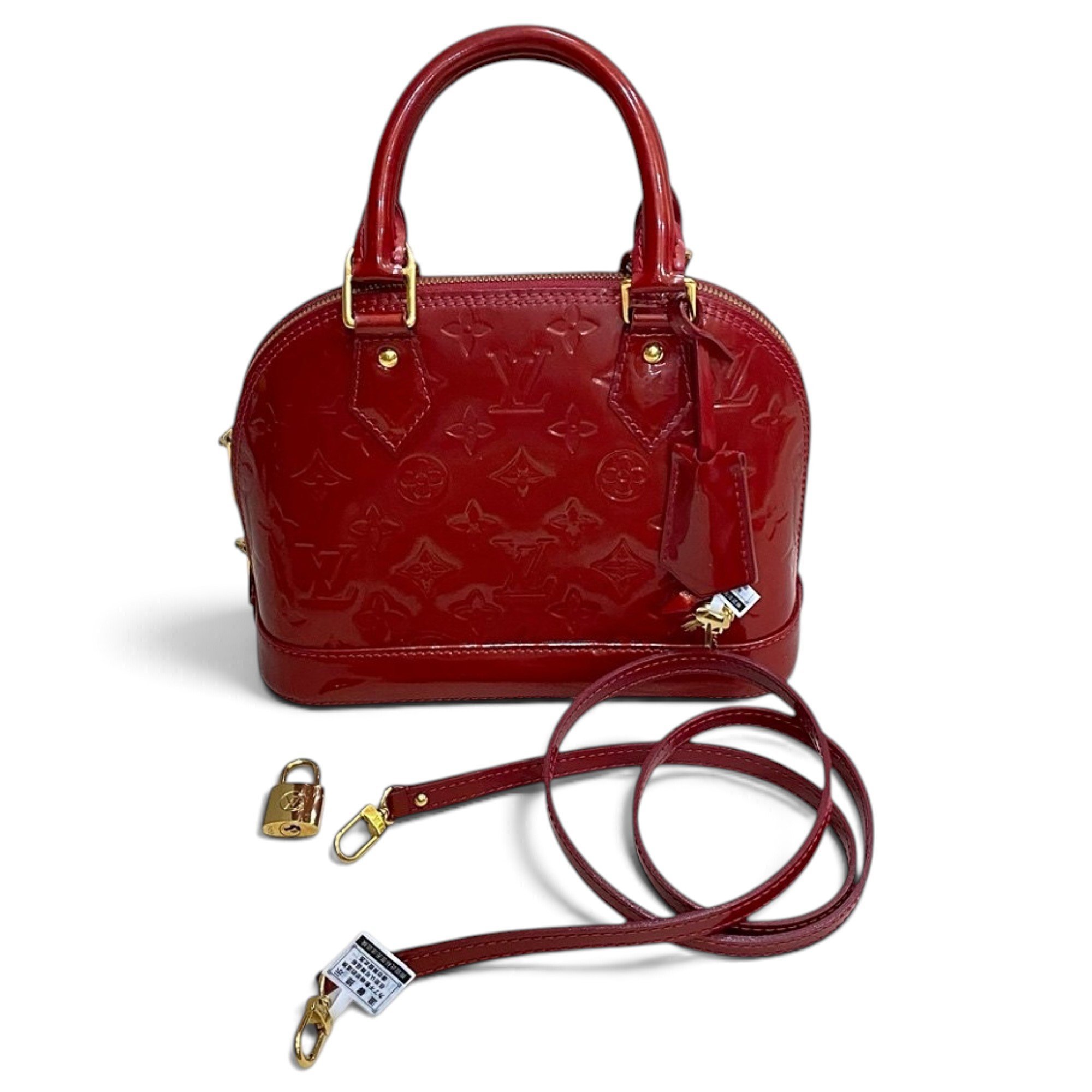 Alma BB patent leather handbag