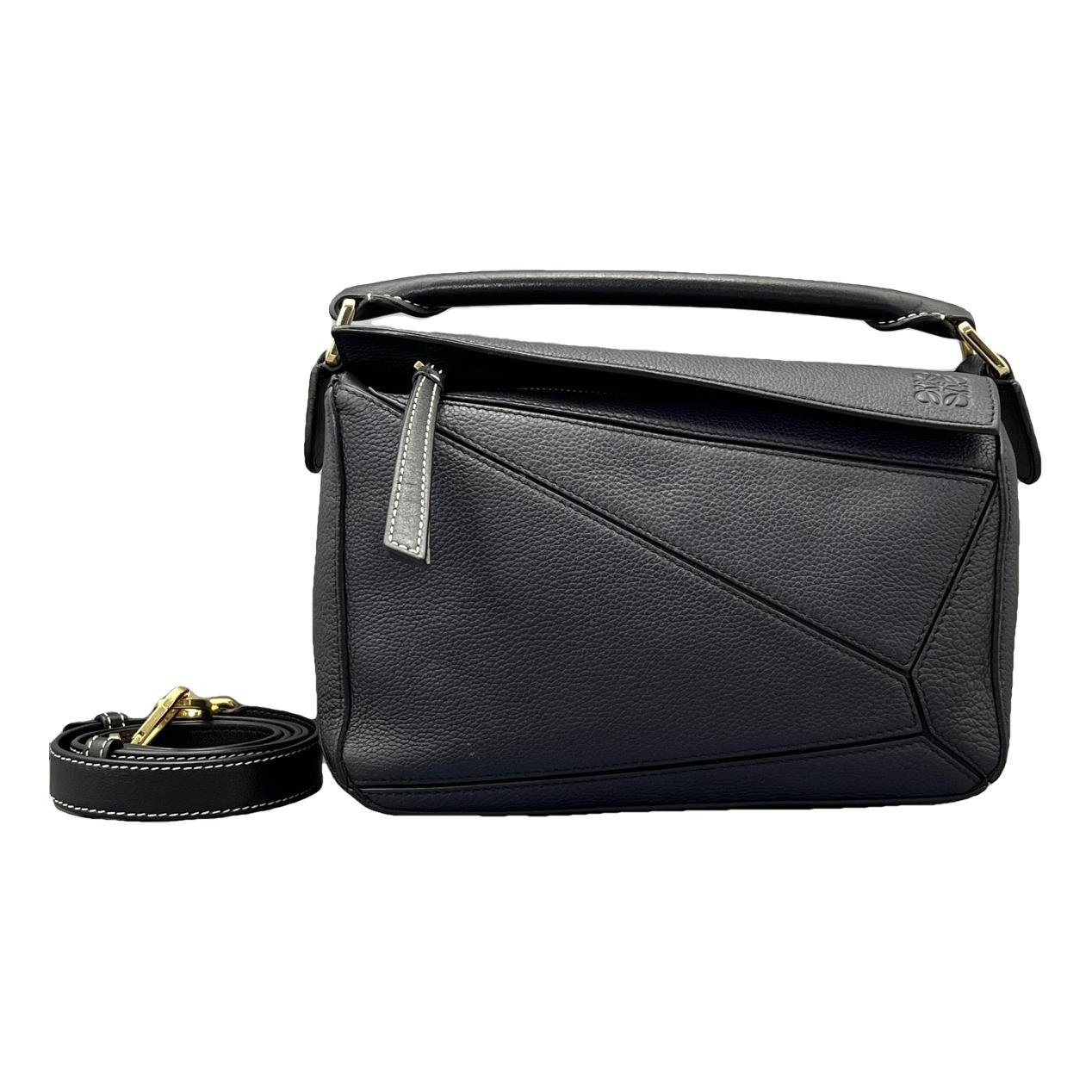 Puzzle leather handbag