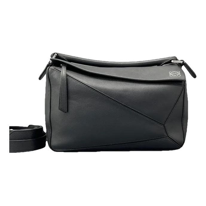 Puzzle leather handbag