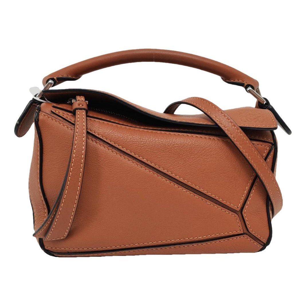 Puzzle leather handbag