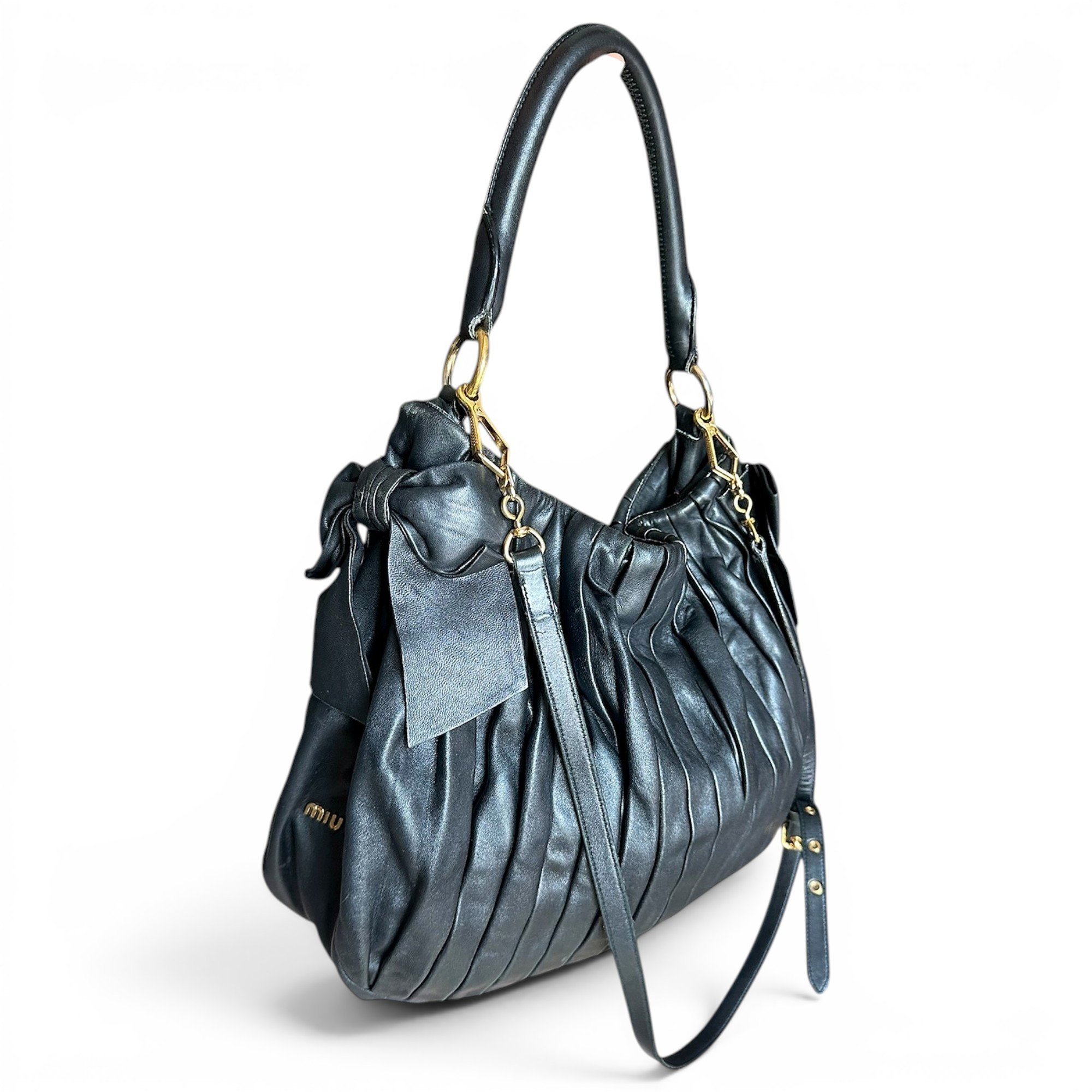 Bow bag leather handbag