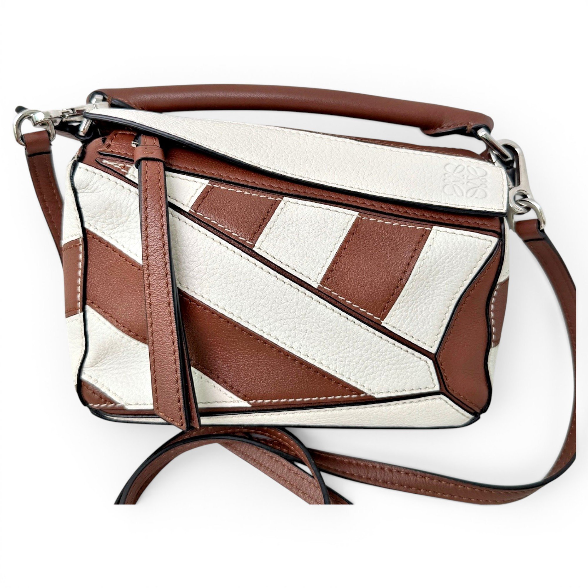 Puzzle leather handbag