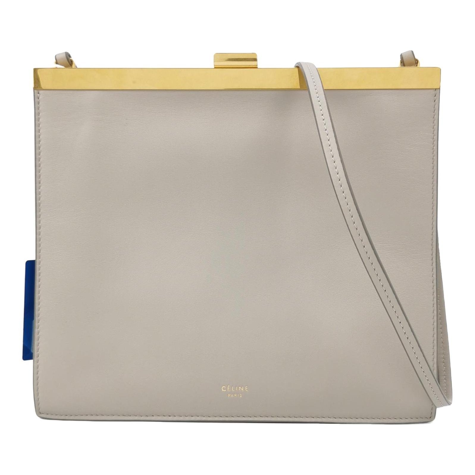 Clasp leather handbag
