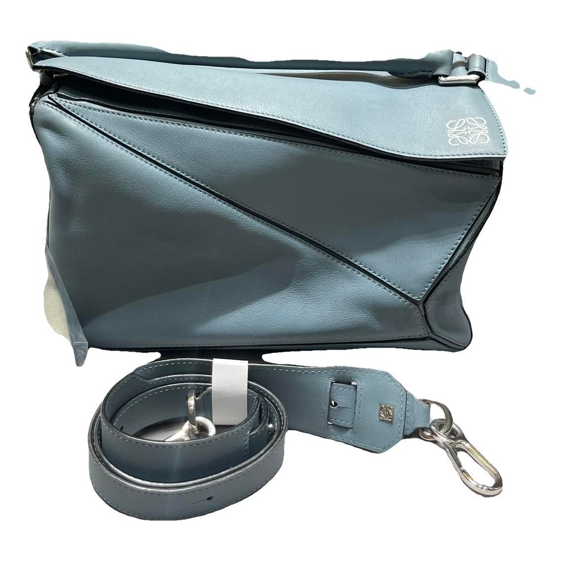 Puzzle leather handbag