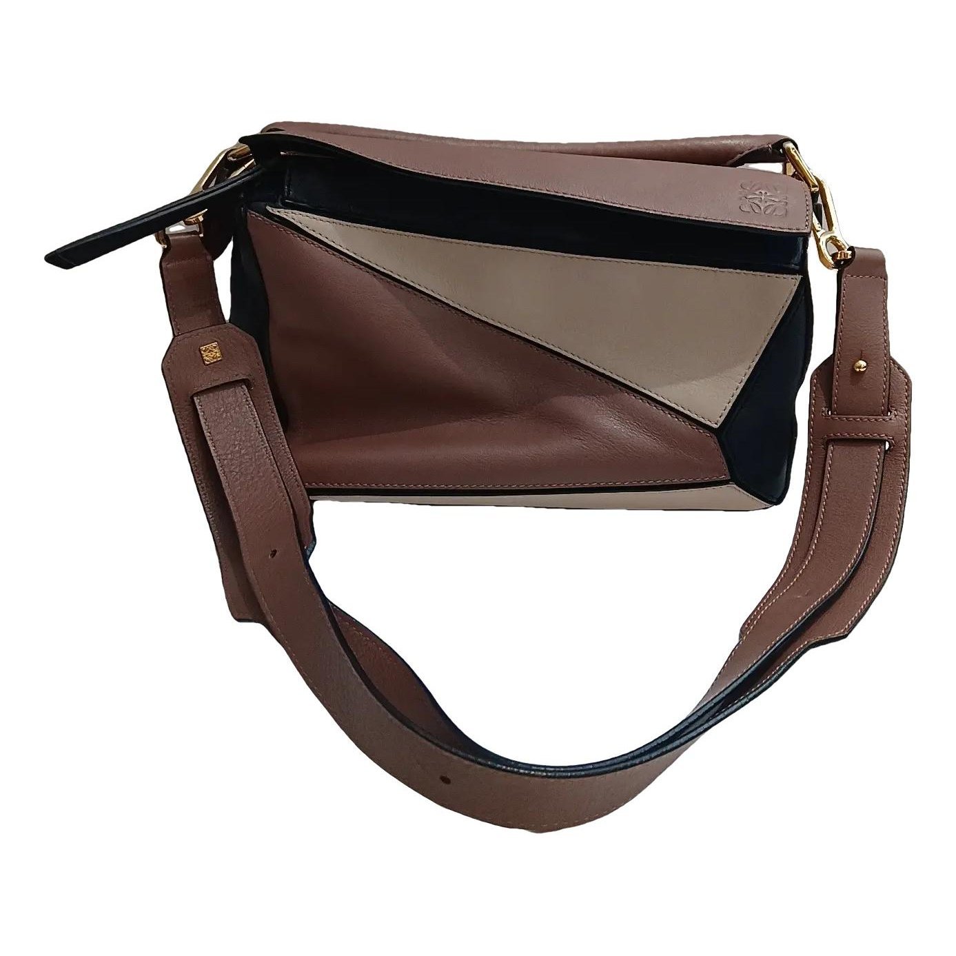 Puzzle leather crossbody bag