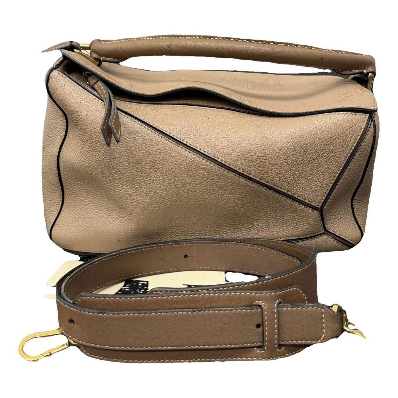 Puzzle leather handbag