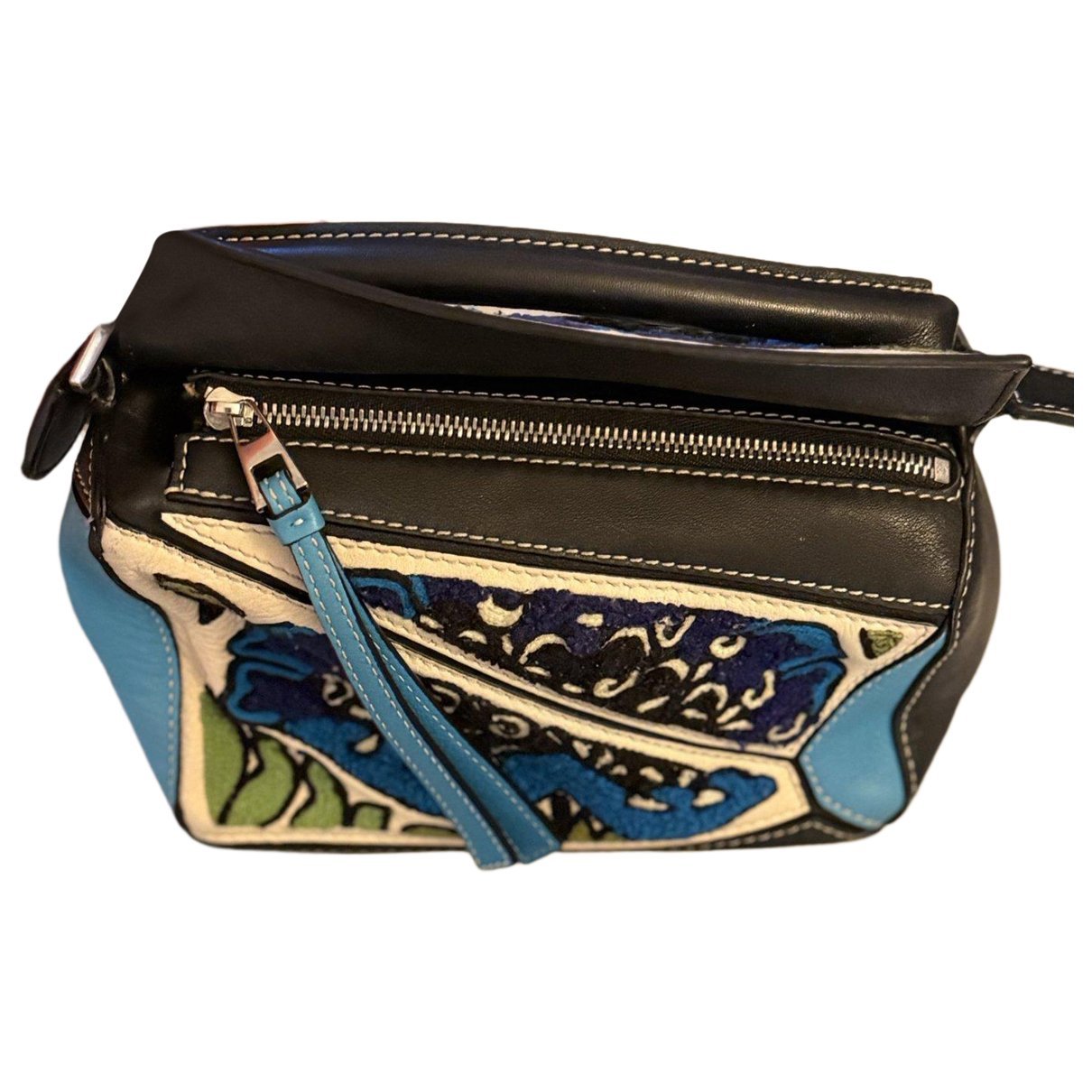Puzzle leather handbag