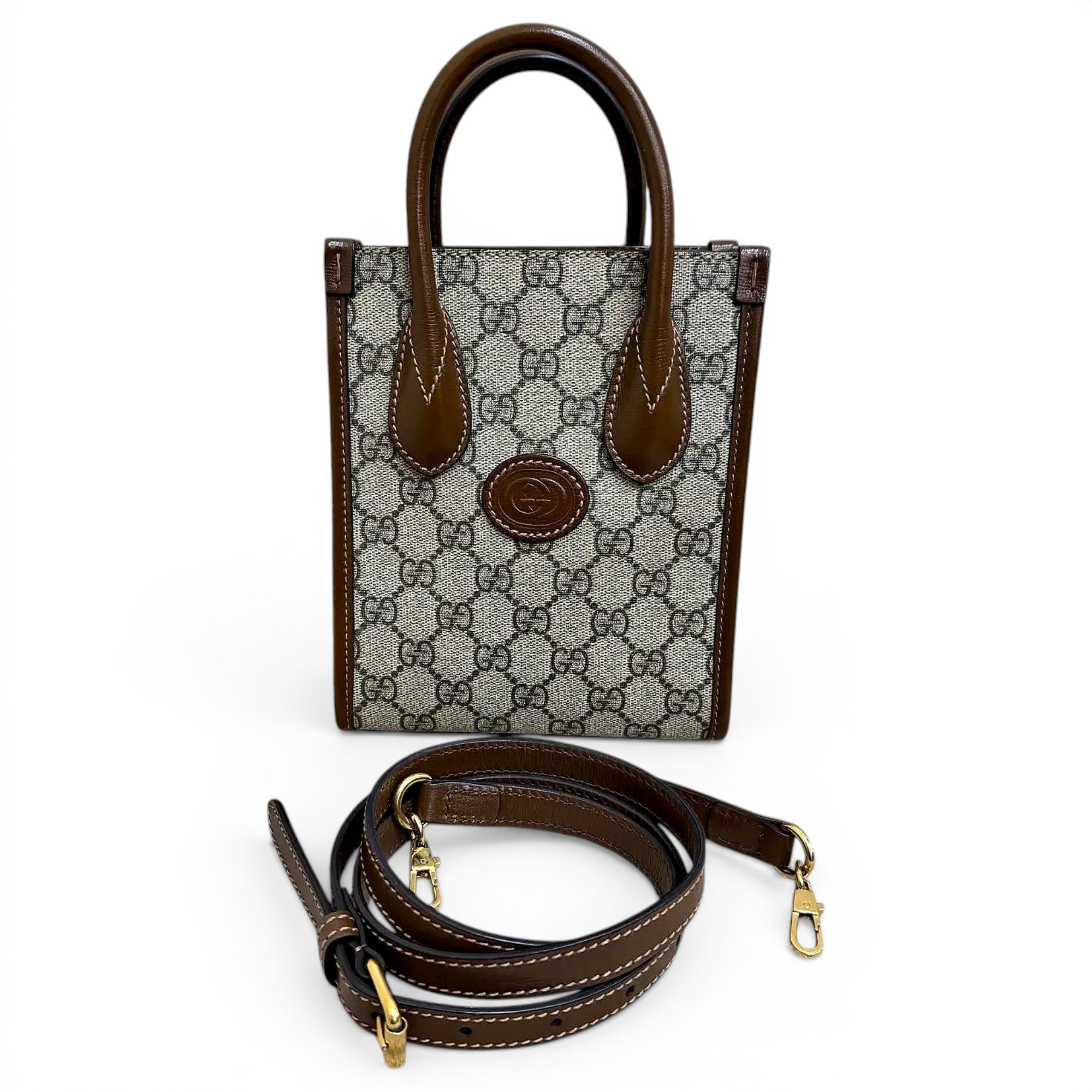 Ophidia Top Handle vinyl crossbody bag
