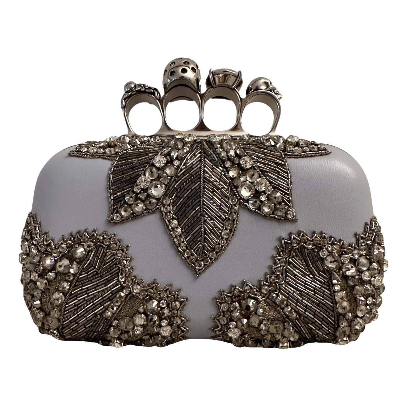 Alexander McQueen Skull leather clutch bag
