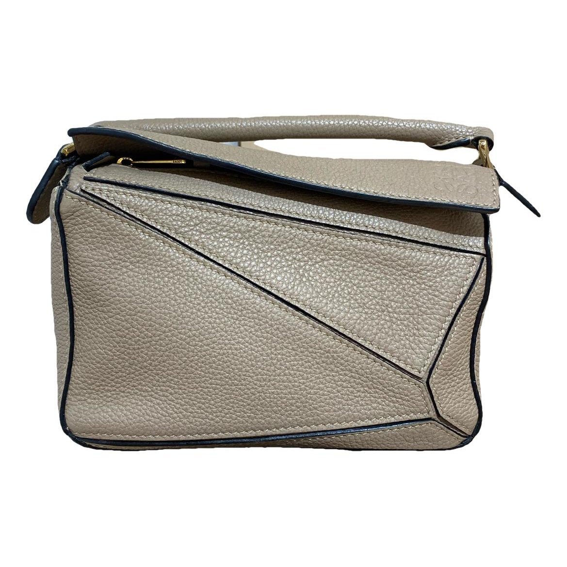 Puzzle leather handbag