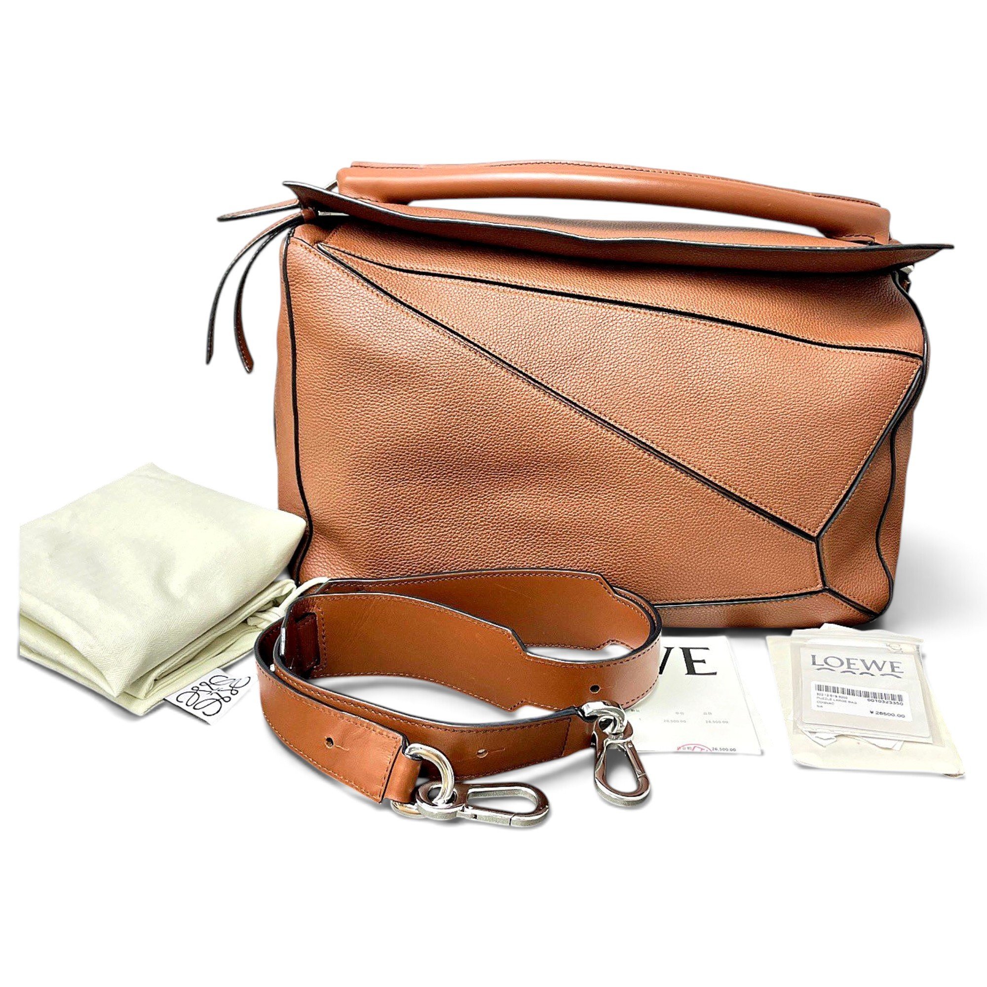 Puzzle leather handbag