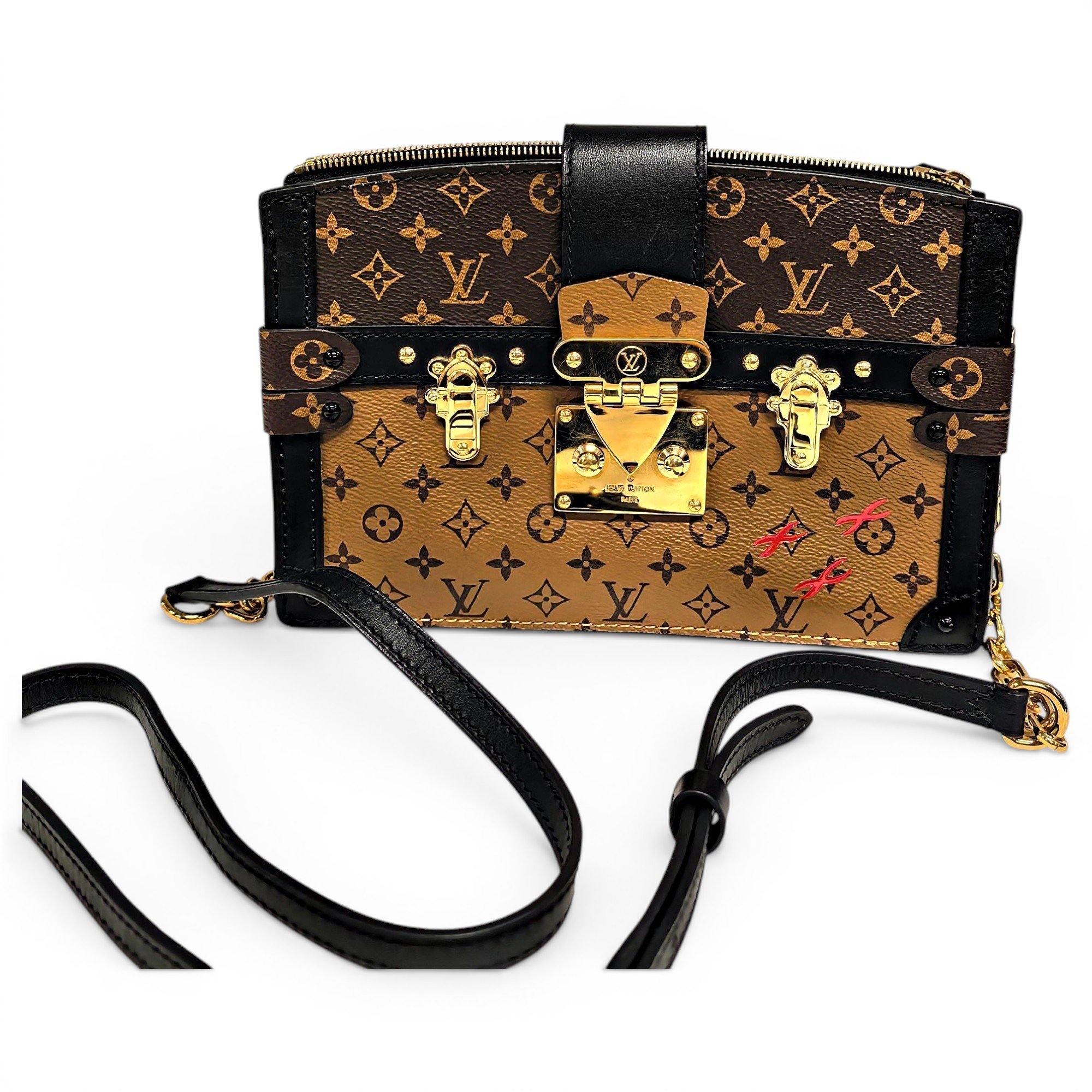 Pochette Trunk leather handbag