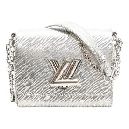 Twist patent leather handbag